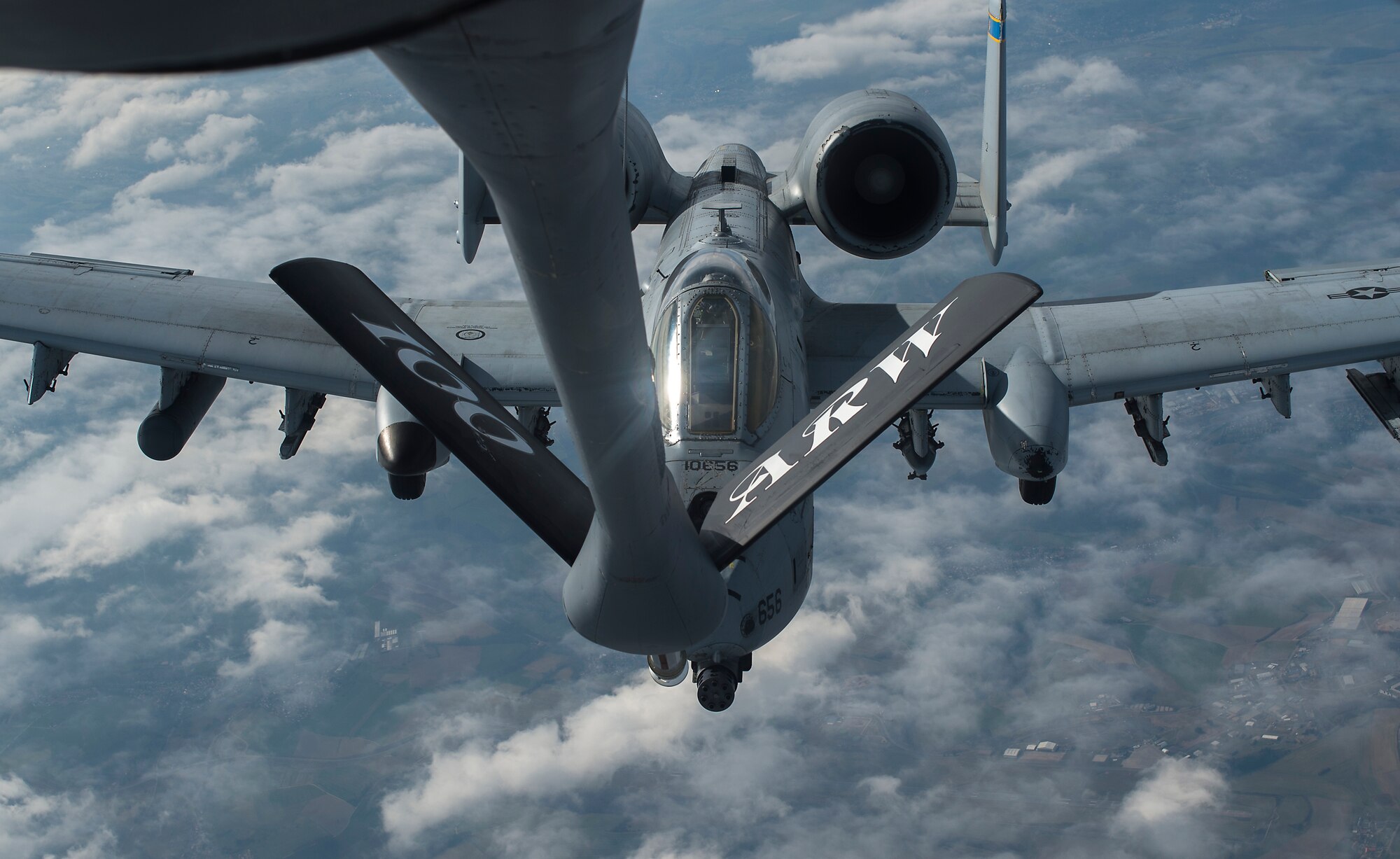 A KC-135 Stratotanker from the 100th Air Refueling Wing, RAF Mildenhall, England, prepares to refuel a 354th Expeditionary Fighter Squadron A-10 Thunderbolt II above Ramstein Air Base, Germany, March 26, 2015. The A-10s deployed as part of a theater security package in support of Operation Atlantic Resolve. The TSP deployments are possible with the strategic access provided by the infrastructure, support and host nation relationship at U.S. and host nation installations. Service members from Ramstein, Spangdahlem Air Base, Germany and RAF Mildenhall, England, were all involved in the aerial refueling training. Aircrew from Mildenhall spent multiple days at Ramstein to operate from the Air Force’s premier power projection platform, giving the A-10s deployed to Spangdahlem quick access to aerial refueling capabilities. (U.S. Air Force photo/Senior Airman Damon Kasberg)