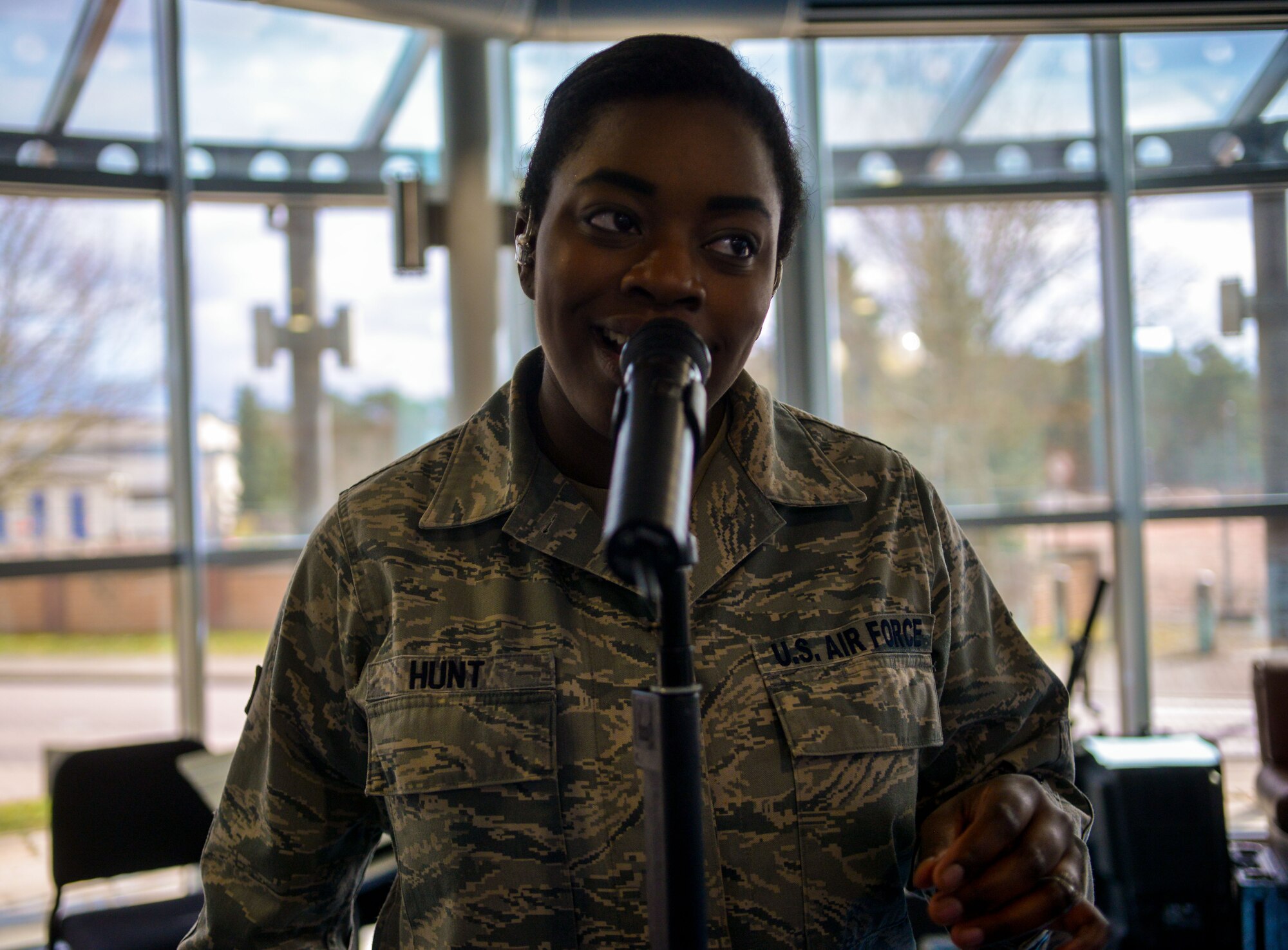 Senior Airman Paula Hunt U.S. Air Forces in Europe Band Touch ‘n Go vocalist, performs at Ramstein Air Base, Germany, March 27, 2015. The band performs at many local events but are also tasked with brining morale to service members and civilians down-range. (U.S. Air Force photo/Senior Airman Nicole Sikorski)                  