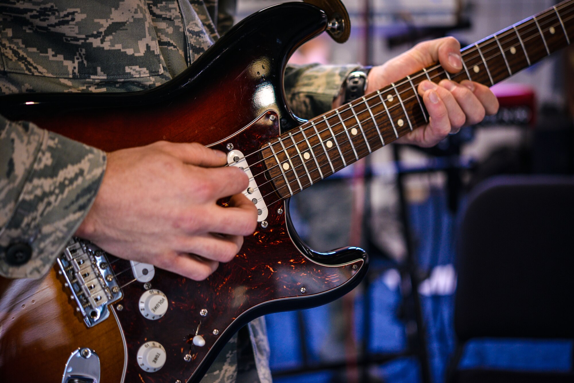 Staff Sgt. Dustin Trimble U.S. Air Forces in Europe Band Touch ‘n Go guitarist, rehearses at Ramstein Air Base, Germany, March 27, 2015. The USAFE Touch ‘n Go band works to spread joy and raise morale for audiences across the globe. (U.S. Air Force photo/Senior Airman Nicole Sikorski)