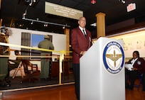 Retired Lt. Col. Rick Sinkfield, San Antonio Chapter president for Tuskegee Airmen Inc., gives a speech about the history and significance of the Tuskegee Airmen during World War II at the Airmen Heritage Museum March 24, 2015 at Joint Base San Antonio- Lackland. The Tuskegee Airmen is a group of African American military pilots who fought in World War II. Formally, they formed the 332nd Fighter Group and the 477th Bombardment Group of the United States Army Air Forces. (U.S. Air Force photo by Benjamin Faske)(released)