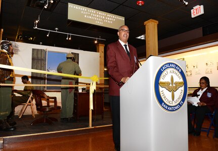 Retired Lt. Col. Rick Sinkfield, San Antonio Chapter president for Tuskegee Airmen Inc., gives a speech about the history and significance of the Tuskegee Airmen during World War II at the Airmen Heritage Museum March 24, 2015 at Joint Base San Antonio- Lackland. The Tuskegee Airmen is a group of African American military pilots who fought in World War II. Formally, they formed the 332nd Fighter Group and the 477th Bombardment Group of the United States Army Air Forces. (U.S. Air Force photo by Benjamin Faske)(released)