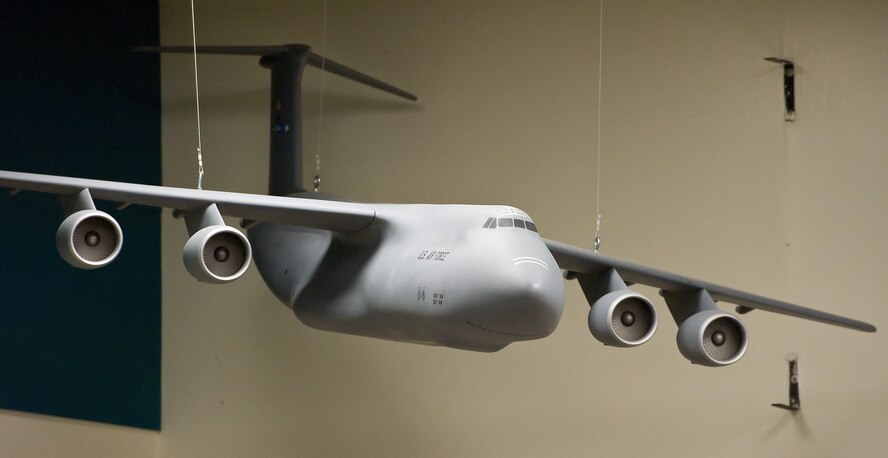 The 2015 Honorary Commanders tour the 436th Airlift Wing staff agencies Feb. 25, 2015, at Dover Air Force Base, Del. The honorary commanders received briefings at each agency they visited and had the opportunity to participate in hands-on training scenarios. (U.S. Air Force photo/Roland Balik)