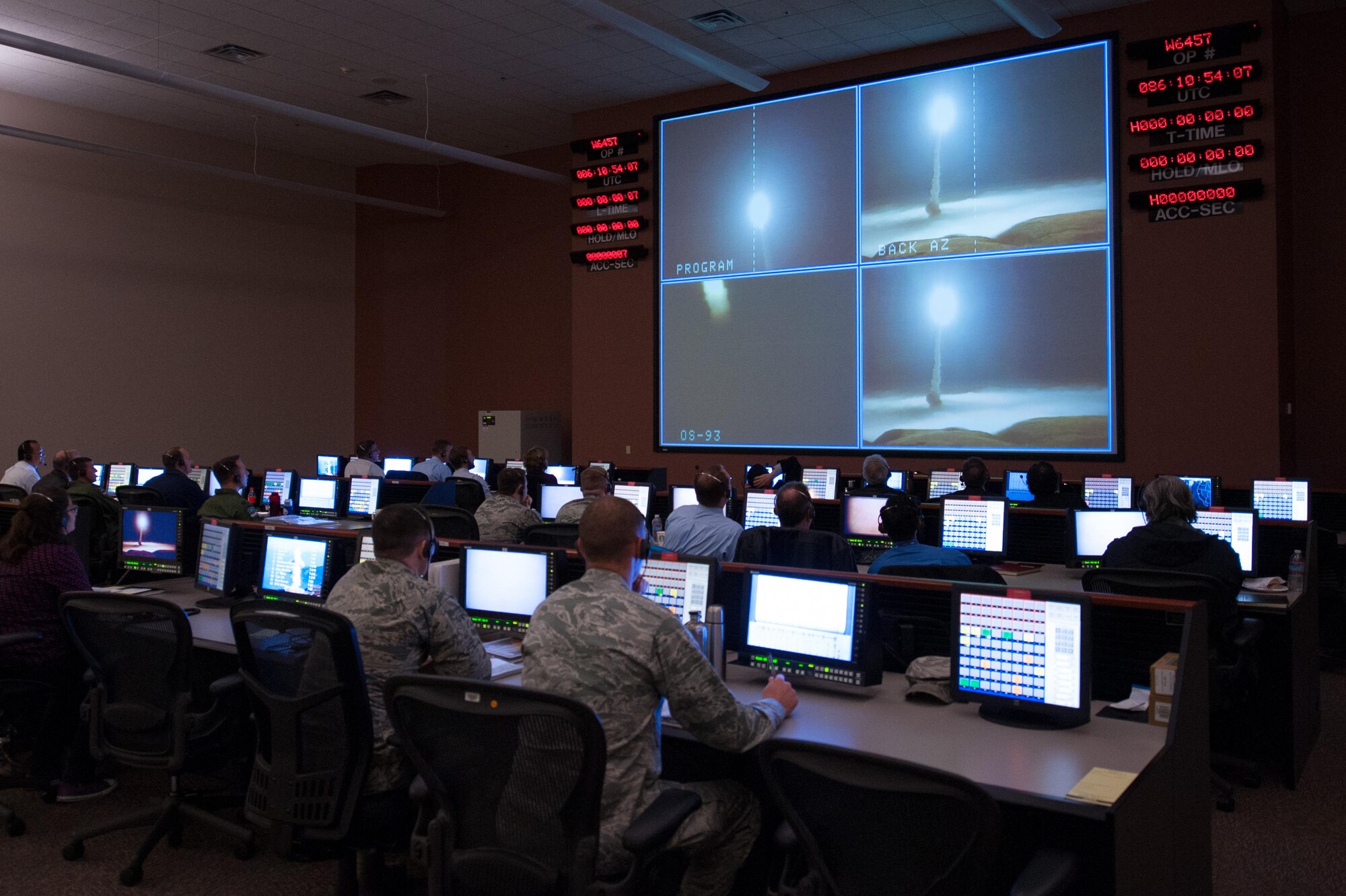 Members of the 576th Flight Test Squadron oversee the launch of an unarmed Minuteman III missile March 27, 2015 at Vandenberg Air Force Base during an operational test launch. The regularly scheduled test launch was the second Minuteman III test this week and provided the Air Force with valuable data on the weapons system, verifying the capability of the intercontinental ballistic missile portion of the nuclear triad. (U.S. Air Force photo by Michael Peterson)