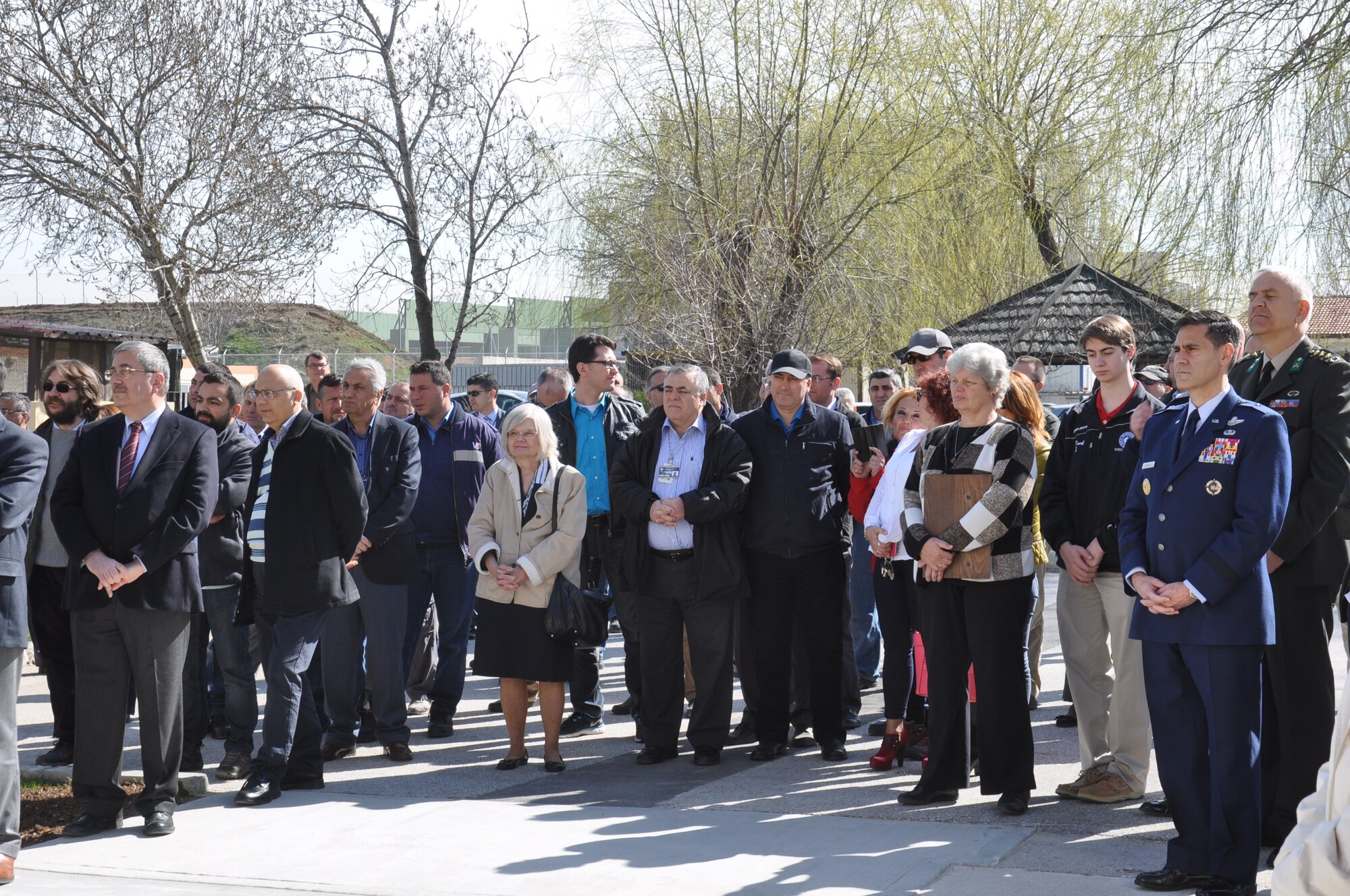 Base personnel and guests attend the grand opening of the new base administrative building March 26, 2015, at the Ankara Support Facility in Turkey.  The building, number 2621, will house the Post Office, Traffic Management Office and the Legal Office. (U.S. Air Force photo by Capt. Laura Balch/Released) 