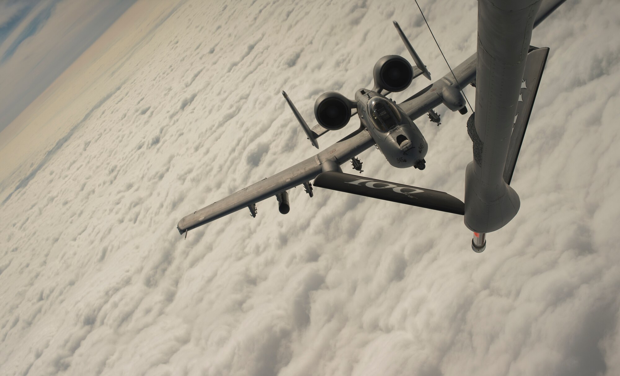 A pilot from 354th Expeditionary Fighter Squadron maneuvers away from a 100th Air Refueling Wing KC-135 Stratotanker after receiving fuel above Ramstein Air Base, Germany, March 26, 2015. The A-10s deployed as part of a theater security package in support of Operation Atlantic Resolve. The deployment of fighters throughout the region brings additional combat capable forces to Europe, which are able to respond to a wide variety of operations. The Air Force’s forward presence in Europe gives the U.S. the support infrastructure to increase current force and build new and deeper partnerships across the continent. (U.S. Air Force photo/Senior Airman Damon Kasberg)