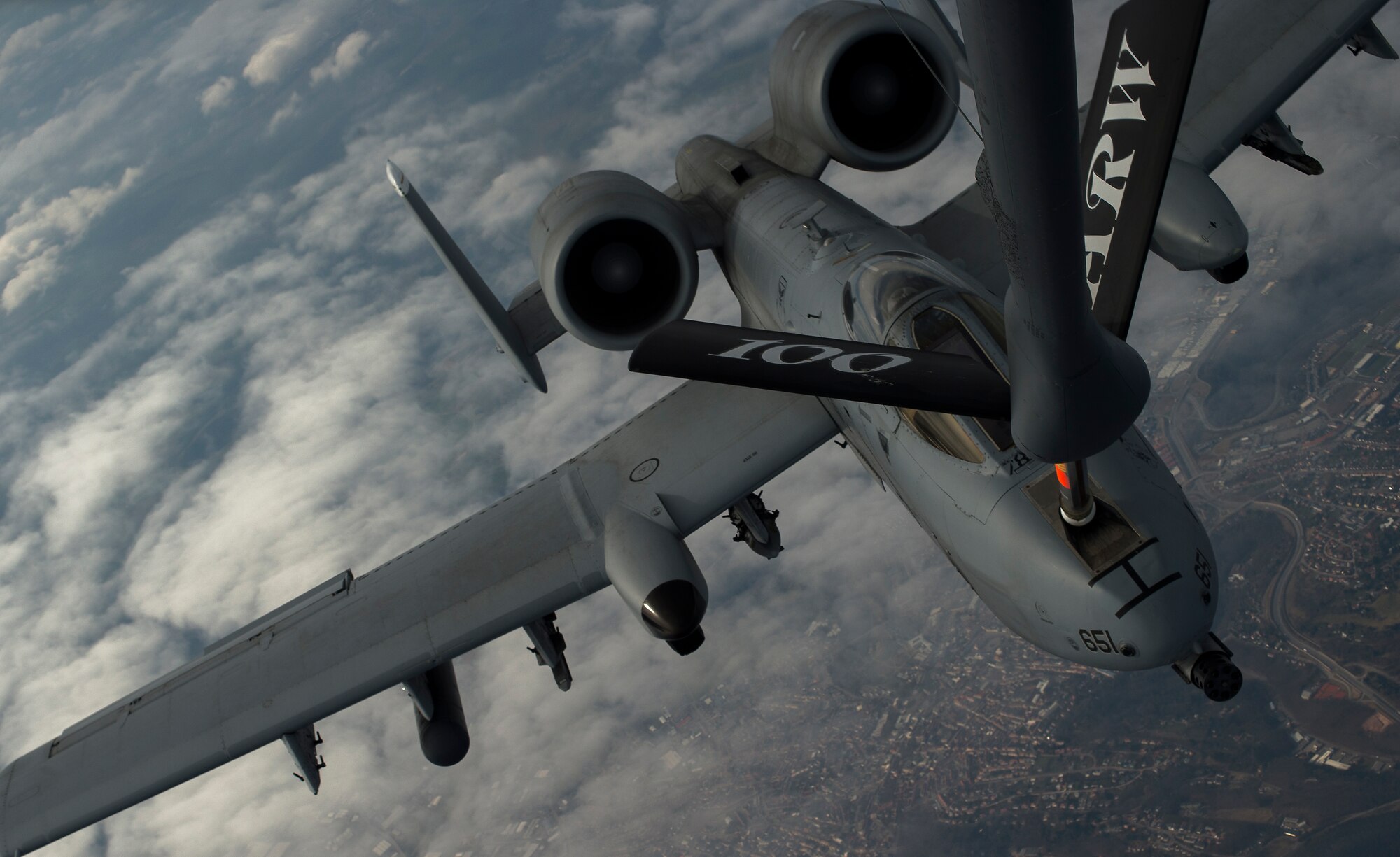 A KC-135 Stratotanker from the 100th Air Refueling Wing refuels a 354th Expeditionary Fighter Squadron A-10 Thunderbolt II above Ramstein Air Base, Germany, March 26, 2015. The A-10s deployed as part of a theater security package in support of Operation Atlantic Resolve. The TSP deployments are possible with the strategic access provided by the infrastructure, support and host nation relationship at U.S. and host nation installations. Service members from Ramstein, Spangdahlem Air Base, Germany and Royal Air Force Mildenhall, England, were all involved in the aerial refueling training. Aircrew from Mildenhall spent multiple days at Ramstein to operate from the Air Force’s premier power projection platform, giving the A-10s deployed to Spangdahlem quick access to aerial refueling capabilities. (U.S. Air Force photo/Senior Airman Damon Kasberg)