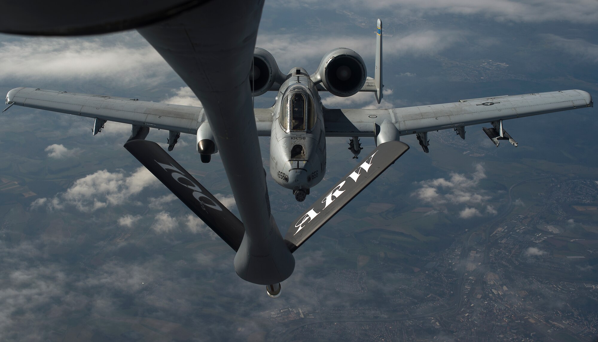 A pilot from 354th Expeditionary Fighter Squadron maneuvers an A-10 Thunderbolt II into position behind a 100th Air Refueling Wing KC-135 Stratotanker to receive fuel above Ramstein Air Base, Germany, March 26, 2015. The A-10s deployed from Davis-Monthan Air Force Base, Ariz. to Germany as part of a theater security package in support of Operation Atlantic Resolve. The Air Force and other services have increased rotational presences in Europe during the past months to reassure NATO allies and partner nations that the United States’ commitment to European security is a priority. (U.S. Air Force photo/Senior Airman Damon Kasberg)