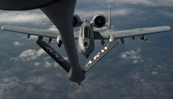 A pilot from 354th Expeditionary Fighter Squadron maneuvers an A-10 Thunderbolt II into position behind a KC-135 Stratotanker from the 100th Air Refueling Wing, RAF Mildenhall, England, to receive fuel above Ramstein Air Base, Germany, March 26, 2015. The A-10s deployed from Davis-Monthan Air Force Base, Ariz. to Germany as part of a theater security package in support of Operation Atlantic Resolve. The Air Force and other services have increased rotational presences in Europe during the past months to reassure NATO allies and partner nations that the United States’ commitment to European security is a priority. (U.S. Air Force photo/Senior Airman Damon Kasberg)