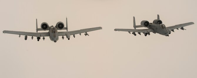 A-10 Thunderbolt IIs from the 354th Expeditionary Fighter Squadron fly in formation after receiving refuel support from a 100th Air Refueling Wing, RAF Mildenhall, England, KC-135 Stratotanker above the Netherlands, March 25, 2015. The A-10s deployed from Davis-Monthan Air Force Base, Ariz. to Germany as part of a theater security package in support of Operation Atlantic Resolve. The Air Force and other services have increased rotational presences in Europe during the past months to reassure NATO allies and partner nations that the United States’ commitment to European security is a priority. (U.S. Air Force photo/Senior Airman Damon Kasberg)