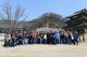 Airmen pose for a group photo during a tour to the Geumsansa Temple at Moaksan Mountain, Republic of Korea, March 21, 2015. Airmen walked the interior of the buildings, viewing Buddhist artworks and treasures, and learned about 1700 years of the temple’s history. (U.S. Air Force photo by Senior Airman Taylor Curry/Released) 
