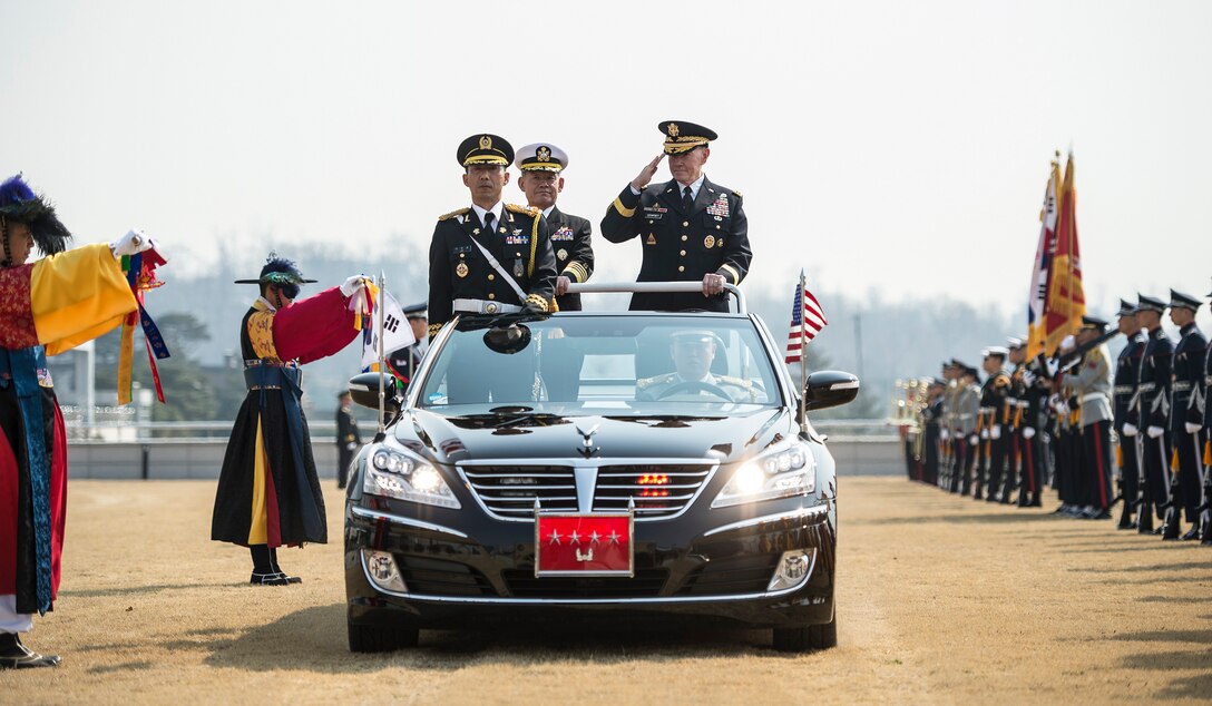 U.S. Army Gen. Martin E. Dempsey, right, chairman of the Joint Chiefs of Staff, and his South Korean counterpart, Adm. Choi Yun-hee, participate in a pass in review during an honor ceremony at the South Korean Joint Chiefs of Staff headquarters in Seoul, South Korea, March 27, 2015. 