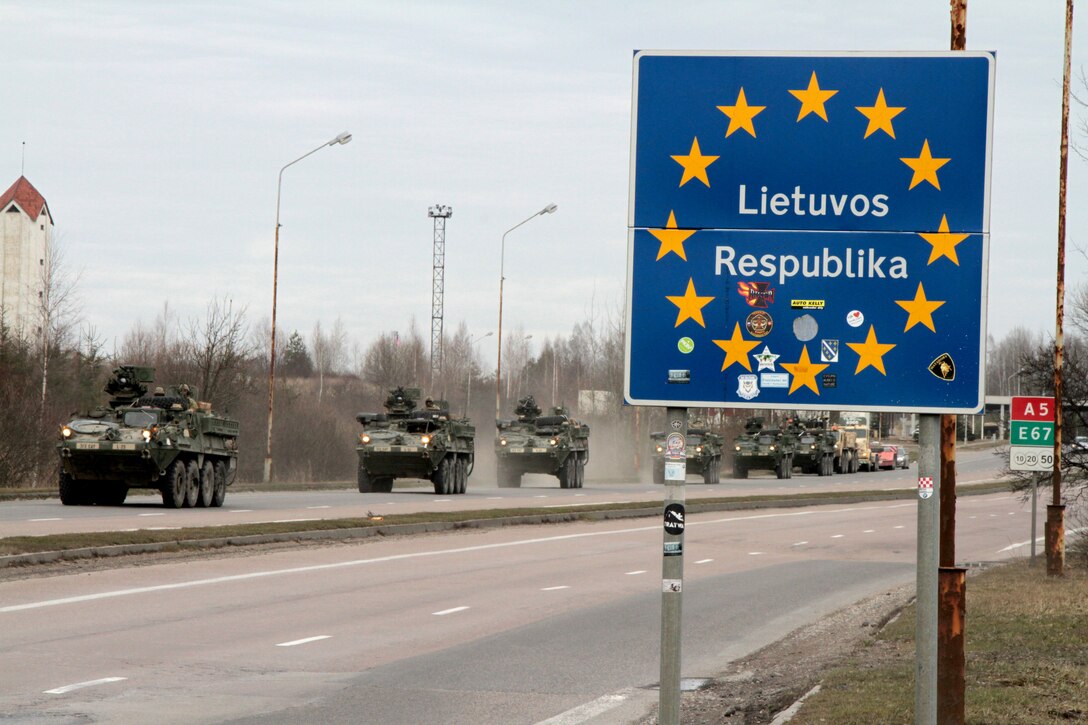 Stryker armored vehicles cross the border between Lithuania and Poland during Operation Dragoon Ride, an 1,800-kilometer road march from locations in Estonia, Latvia, Lithuania and Poland to Rose Barracks, Vilseck, March 23, 2015. 