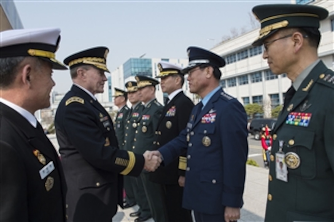 U.S. Army Gen. Martin E. Dempsey, second from left, chairman of the Joint Chiefs of Staff, meets with South Korean senior military leadership after an honor ceremony at the South Korean Joint Chiefs of Staff headquarters in Seoul, South Korea, March 27, 2015. Dempsey is visiting Seoul as part of a two-day trip to reinforce the U.S.-South Korean alliance.
