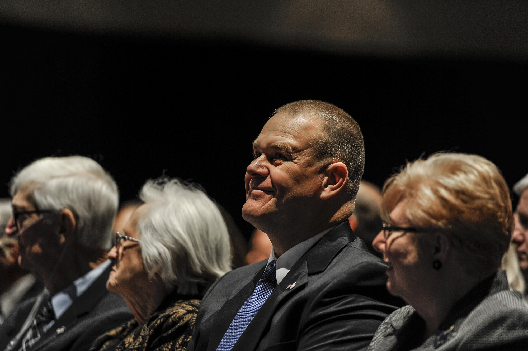 Chief Master Sgt. of the Air Force #16, James Roy, smiles during a celebration of life ceremony for Chief Master Sgt. Of the Air Force #9, James C. Binnicker, at the Emerald Coast Convention Center, Fort Walton Beach, Fla., March 28, 2015. More than 1,000 people attended Binnicker’s celebration of life ceremony. He died March 21 in Calhoun, Ga. He was 76 years old. A memorial service and interment will be at Arlington National Cemetery, Virginia, at a later date. (U.S. Air Force photo/Senior Airman Christopher Callaway)