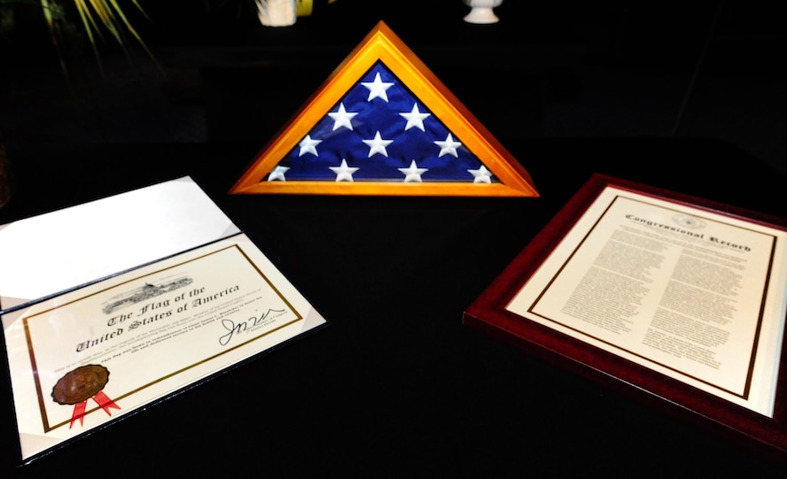A flower display surrounds Chief Master Sgt. of the Air Force #9 James C. Binnicker’s awards and decorations during his celebration of life ceremony at the Emerald Coast Convention Center, Fort Walton Beach Fla., March 28, 2015. During his tenure as the ninth chief master sergeant of the Air Force, Binnicker led the transformation from the Airman Performance Report to the Enlisted Performance Report, and developed the performance feedback system. He also worked to have master sergeants admitted to the Air Force Senior NCO Academy, and to increase the opportunities for minorities and women throughout the Air Force.  (U.S. Air Force photo/Airman 1st Class Andrea Posey)