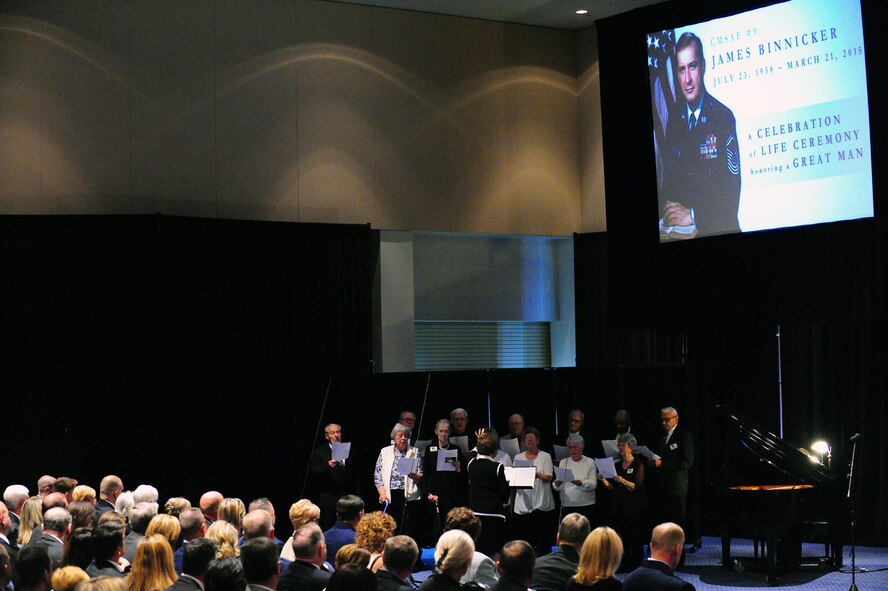 The Bob Hope Village Choir sings during Chief Master Sgt. of the Air Force #9 James C. Binnicker’s celebration of life ceremony at the Emerald Coast Convention Center, Fort Walton Beach Fla., March 28, 2015. More than 1,000 people attended Binnicker's celebration of life ceremony. He died March 21 in Calhoun, Ga. He was 76 years old. A memorial service and interment will be at Arlington National Cemetery, Virginia, at a later date. (U.S. Air Force photo/Airman 1st Class Andrea Posey)