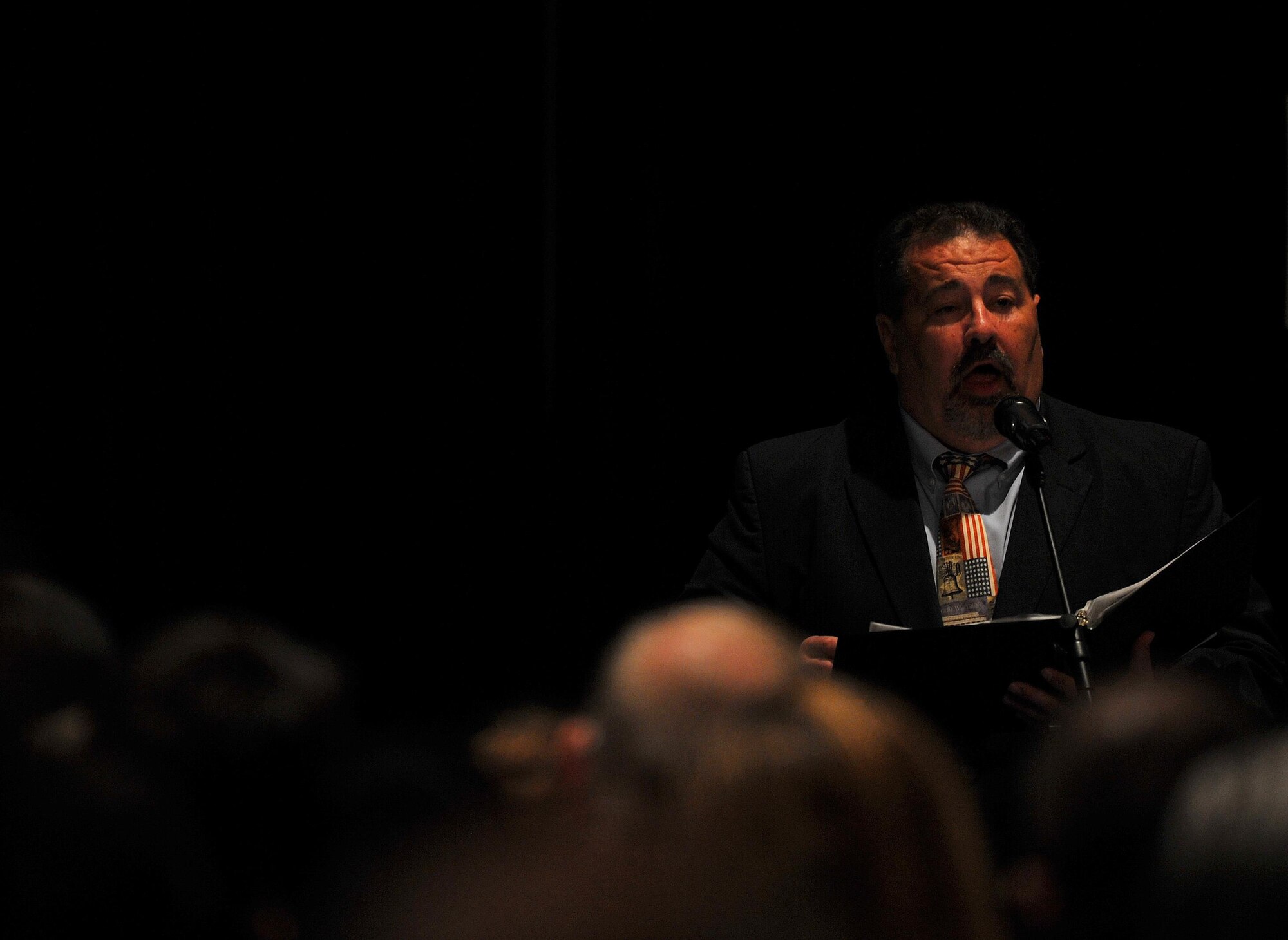 Mr. Jeff Keeman sings during the celebration of life ceremony for Chief Master Sgt. of the Air Force #9 James C. Binnicker at the Emerald Coast Convention Center, Fort Walton Beach, Fla., March 28, 2015. More than 1,000 people attended Binnicker's celebration of life ceremony. He died March 21 in Calhoun, Ga. He was 76 years old. A memorial service and interment will be at Arlington National Cemetery, Virginia, at a later date. (U.S. Air Force photo by Airman 1st Class Ryan Conroy/Released)