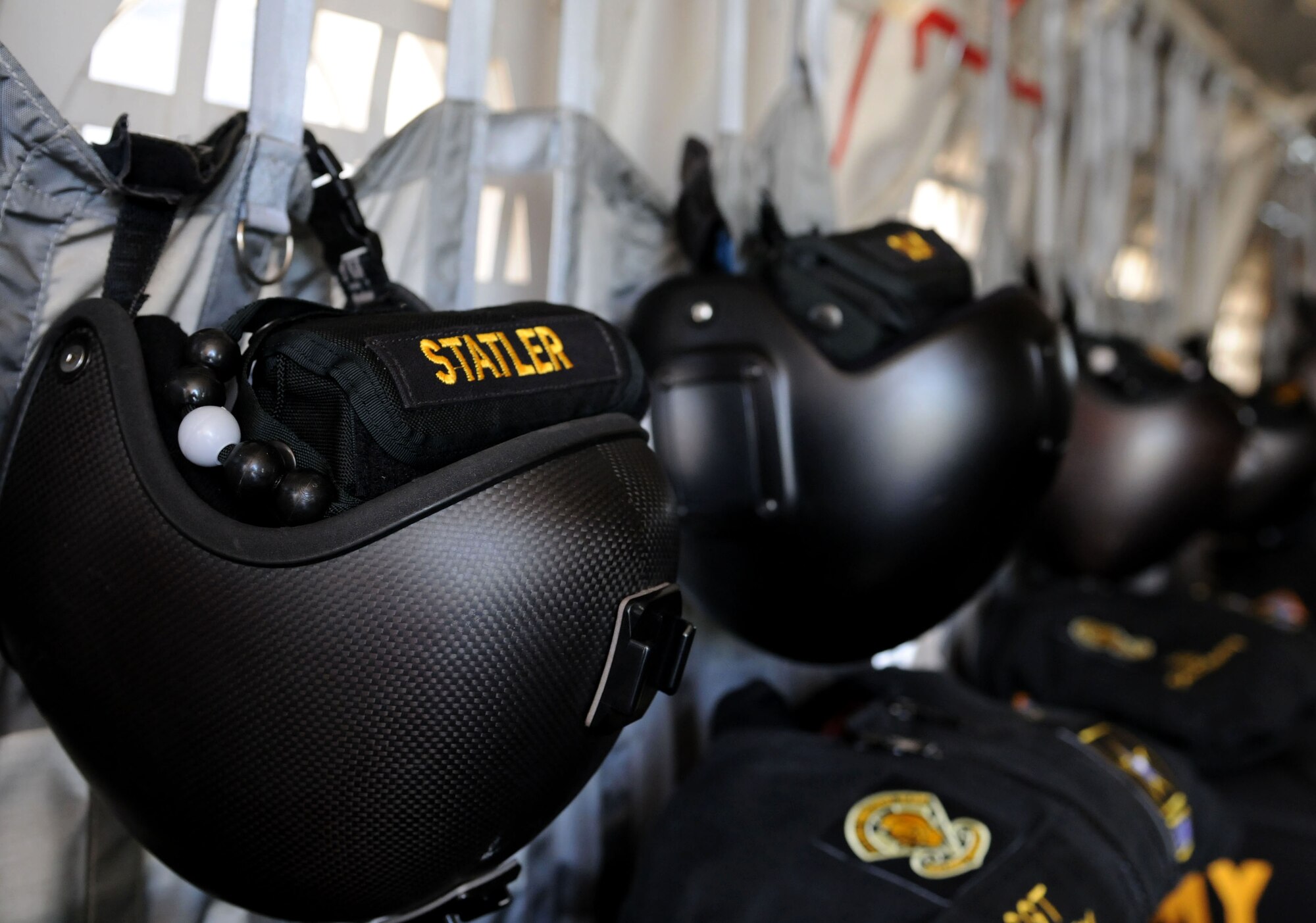 Helmets, parachute packs and jump gear sit on display inside the U.S. Army Parachute Team “Golden Knights” Team Black C-31A before the team’s afternoon performance at the 2015 Keesler Air Show/Open House, March 28, 2015, Keesler Air Force Base, Miss. This was Keesler’s first air show since 2011, and featured 17 aerial acts, 27 static displays and was headlined by the U.S. Air Force Thunderbirds Aerial Demonstration Team. (U.S. Air Force photo by Airman 1st Class Duncan McElroy)