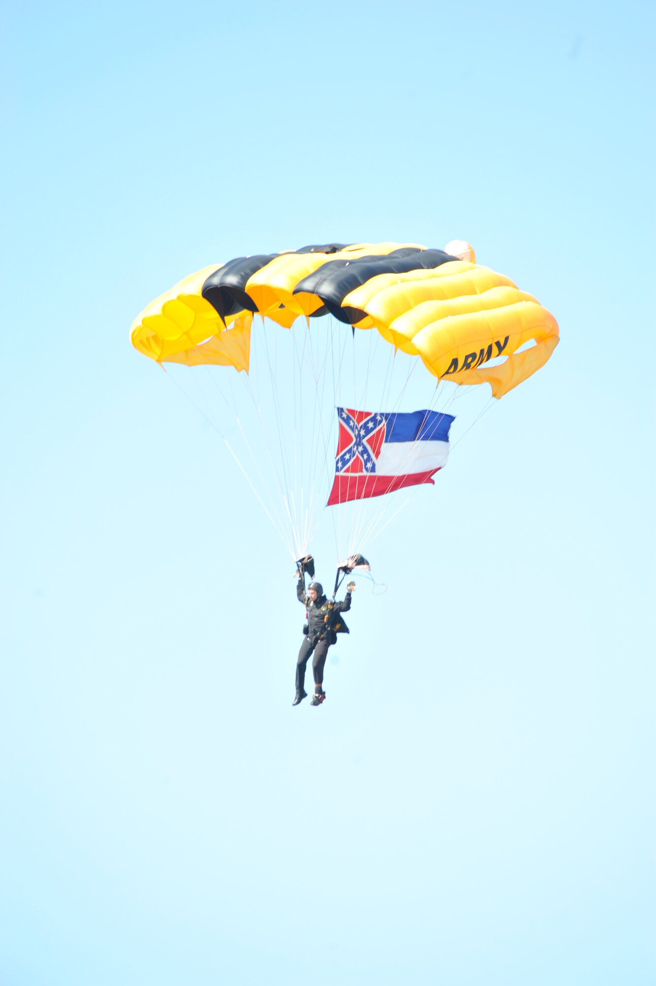 The U.S. Army Golden Knights parachute team jumped out of an aircraft at over 12,500 feet and landed on the Keesler Air Force Base flight line during the Thunder on the Bay Air Show and Open House March 28, 2015. (U.S. Air Force photo/Master Sgt. Jessica Kendziorek)