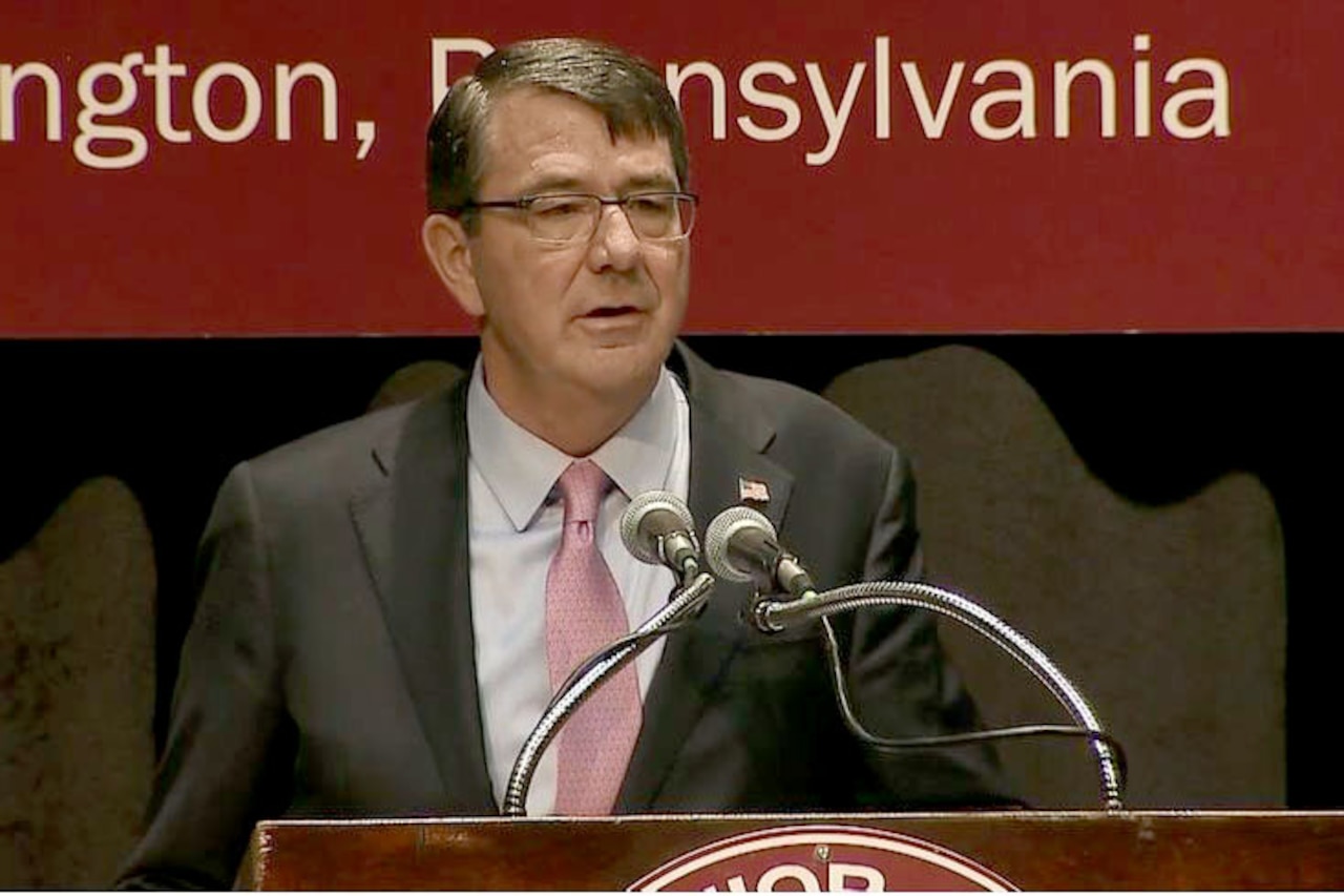 Defense Secretary Ash Carter delivers remarks to students at his high school alma mater, Abington Senior High School in Abington, Pa., March 30, 2015. Carter spoke about building "the force of the future" and what the Defense Department must do to maintain its superiority well into the 21st century. 
DoD screen shot 
