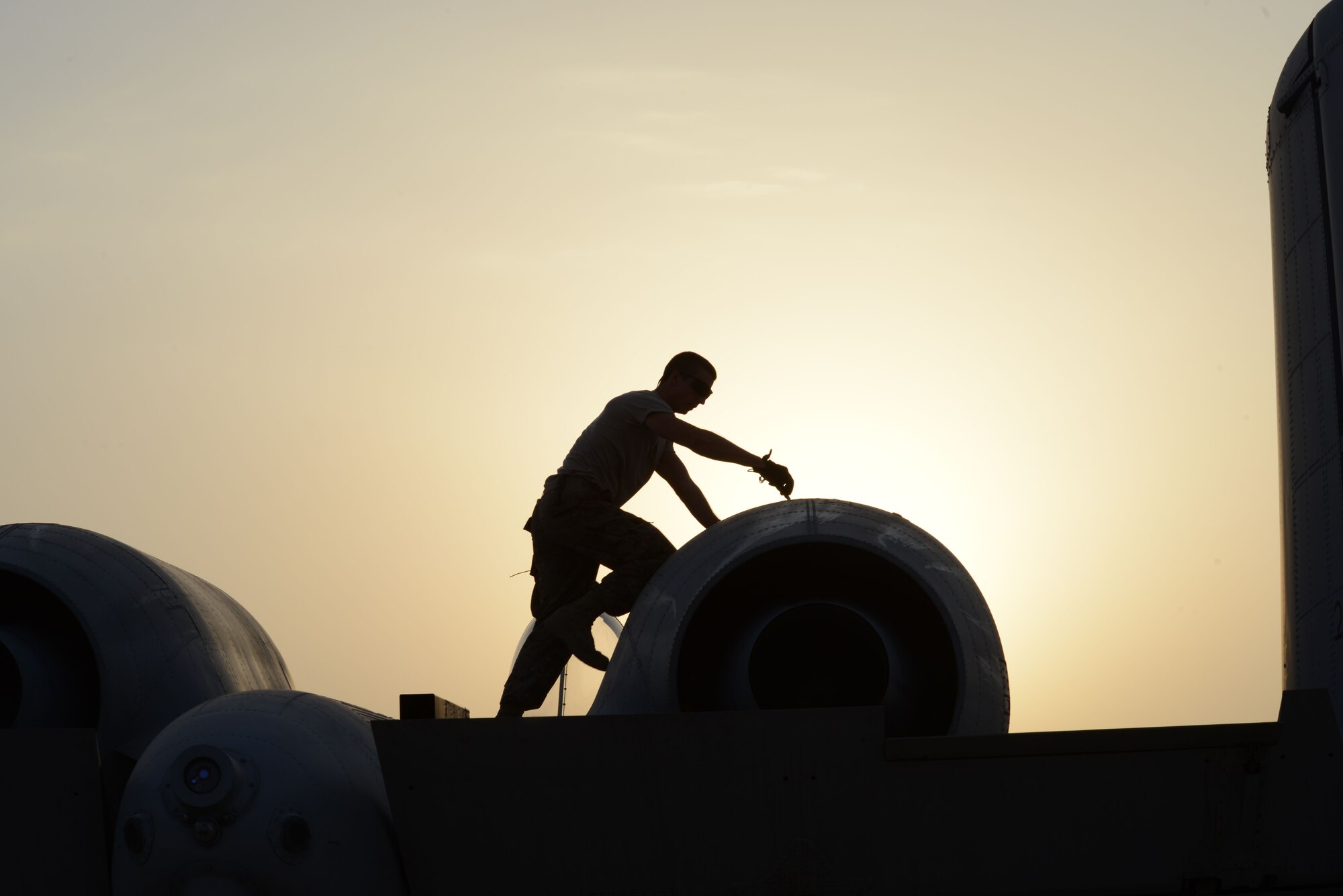 An Airman works on an A-10 Thunderbolt II from the 163rd Expeditionary Fighter Squadron after its arrival here in November. Since their arrival to the 332nd Air Expeditionary Group here, A-10s have expended nearly 50,000 rounds of ammunition and dropped approximately 500 bombs and maverick missiles in support of Operation INHERENT RESOLVE. (U.S. Air Force photo by Tech. Sgt. Jared Marquis)