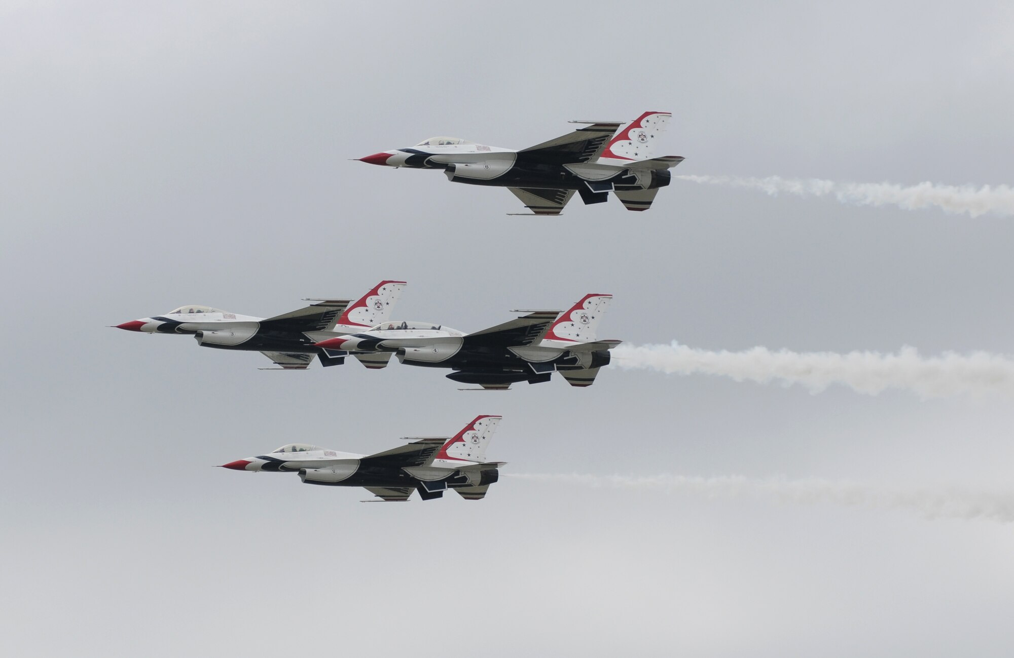 The U.S. Air Force Thunderbirds fly information during Keesler’s 2015 Air Show/Open House March 29, 2015, at Keesler Air Force Base, Miss. The Thunderbirds headlined the two-day event held March 28-29.  Approximately 155,000 people were in attendance for the two-day show. (U.S. Air Force photo by Kemberly Groue)