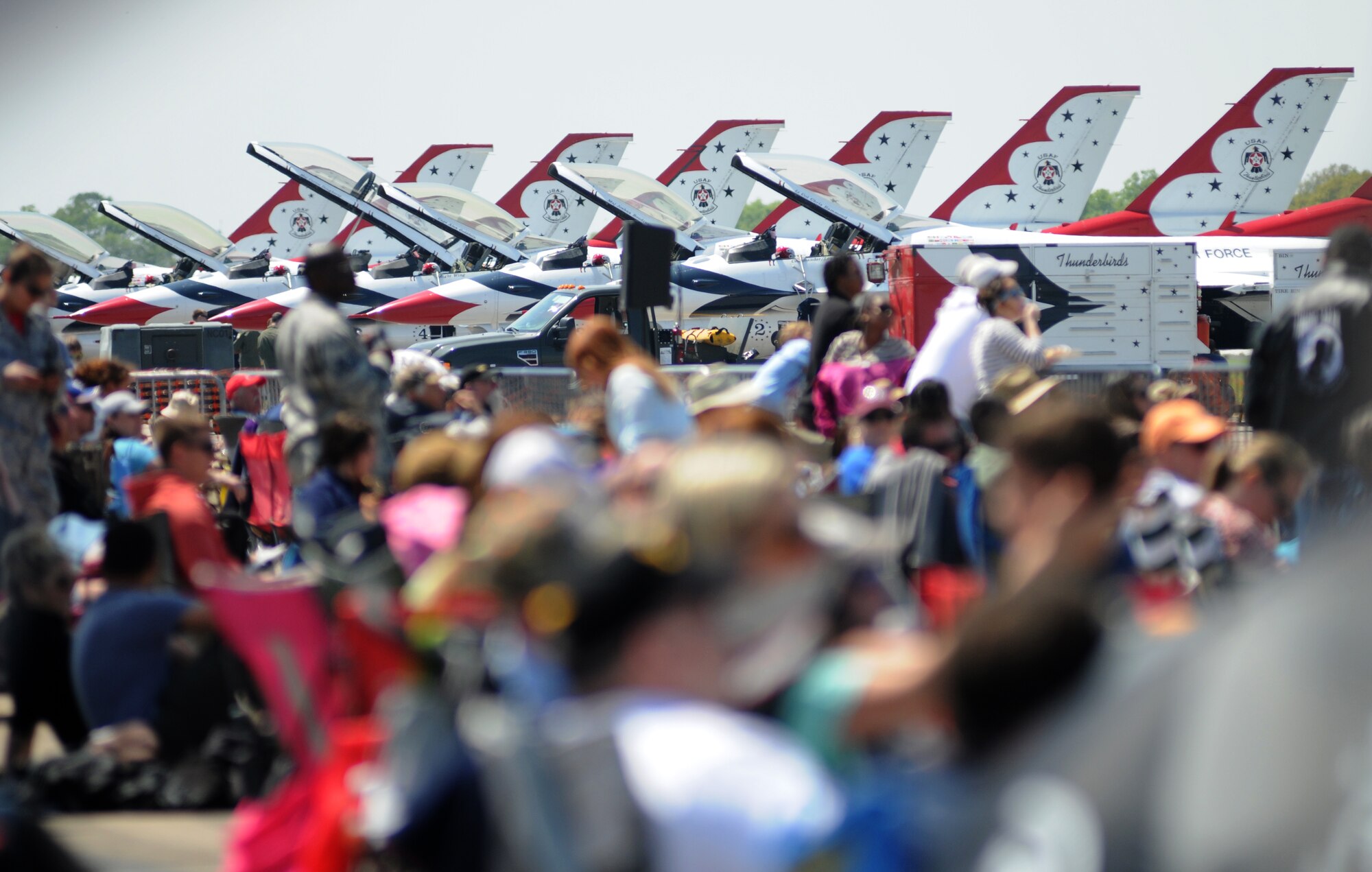 The U.S. Air Force Thunderbirds F-16 Fighting Falcons line the runway during Keesler’s 2015 Air Show/Open House March 29, 2015, at Keesler Air Force Base, Miss. The Thunderbirds headlined the two-day event held March 28-29.  Approximately 155,000 people were in attendance for the two-day show. (U.S. Air Force photo by Kemberly Groue)