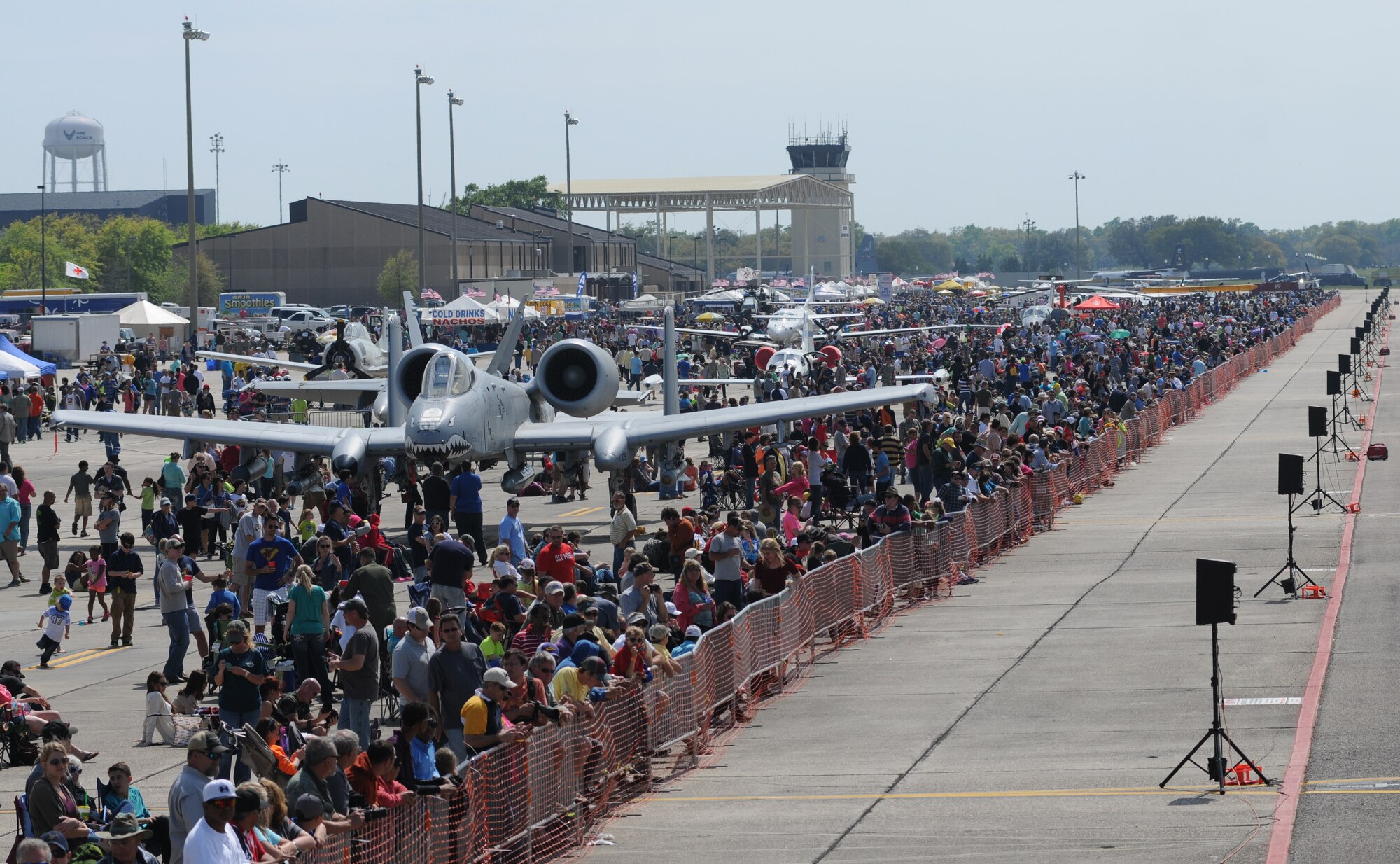 Crowds gather to watch Keesler’s 2015 Air Show/Open House March 29, 2015, at Keesler Air Force Base, Mississippi. The event included the U.S. Air Force Thunderbirds and Army Golden Knights along with many other performers, static displays and vendors.  Approximately 155,000 people were in attendance for the two-day show.  (U.S. Air Force photo by Kemberly Groue)