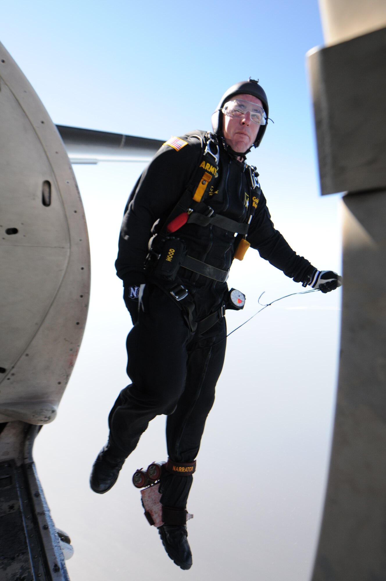 Army Sergeant First Class Corey Hood, a member of the U.S. Army Golden Knights parachute team, jumps from a C-31A at over 12, 500 feet during opening ceremonies for the Keesler Air Force Base, Mississippi, Air Show/Open House, March 29, 2015.  Approximately 155,000 people were in attendance for the two-day show. (U.S. Air Force photo by Kemberly Groue)