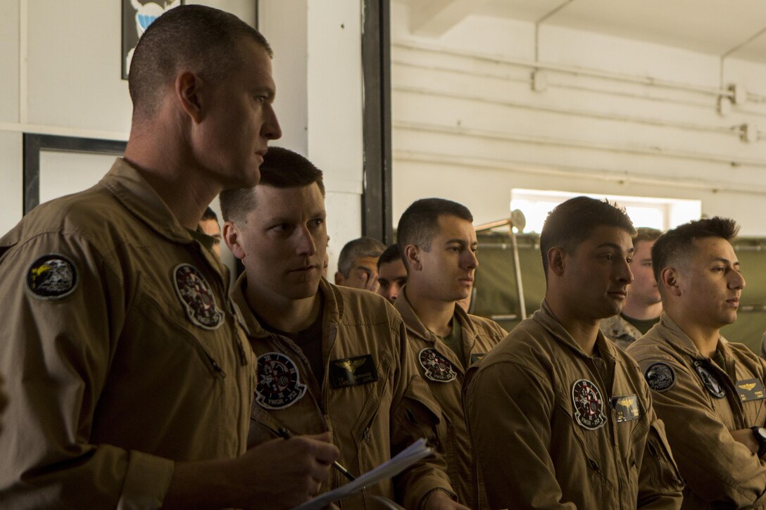 U.S. Marines with Special-Purpose Marine Air-Ground Task Force Crisis Response-Africa are briefed by service members of the Spanish Airborne Brigade before conducting a bilateral training exercise near Madrid, Spain, March 16, 2015. The training exercise tested the capabilities of the two NATO forces as they worked together to safely conduct more than 350 jumps. (U.S. Marine Corps photograph by Lance Cpl. Christopher Mendoza/Released)