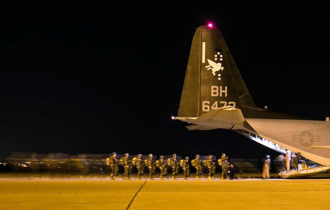 Service members with the Spanish Airborne Brigade board a KC-130J Hercules with Special-Purpose Marine Air-Ground Task Force Crisis Response-Africa, during a bilateral training exercise near Madrid, Spain, March 16, 2015. Approximately 350 Spanish paratroopers jumped and dropped cargo out of an MV-22 Osprey and a KC-130J Hercules as part of a combined training exercise to further improve relations and enhance interoperability between the two NATO allies. (U.S. Marine Corps photograph by Sgt. Paul Peterson/Released)