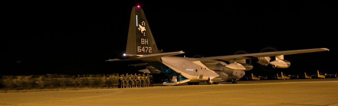 Service members with the Spanish Airborne Brigade board a KC-130J Hercules with Special-Purpose Marine Air-Ground Task Force Crisis Response-Africa, during a bilateral training exercise near Madrid, Spain, March 16, 2015. Approximately 350 Spanish paratroopers jumped and dropped cargo out of an MV-22 Osprey and a KC-130J Hercules as part of a combined training exercise to further improve relations and enhance interoperability between the two NATO allies. (U.S. Marine Corps photograph by Sgt. Paul Peterson/Released)