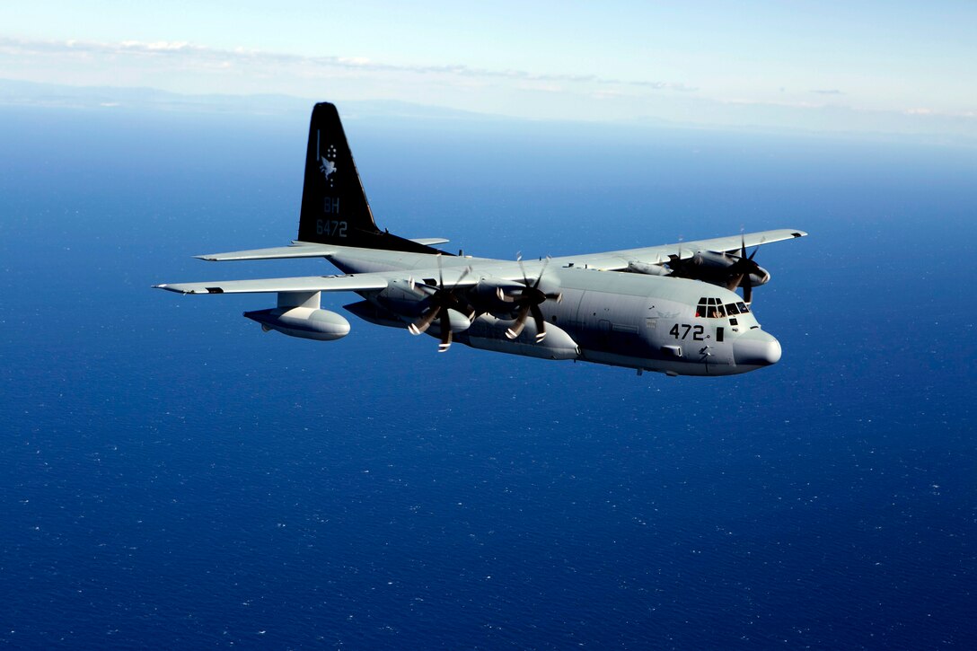 Two KC-130J Hercules tankers with Special-Purpose Marine Air-Ground Task Force Crisis Response-Africa, conduct a formation flight near Moròn Air Base, Spain, March 25, 2015. The Hercules, largely used to transport assets and refuel additional aircraft, is utilized for crisis-response missions ranging from disaster relief and humanitarian aid to embassy evacuation and security operations. (U.S. Marine Corps photograph by 1st Lt. Danielle Dixon/Released)