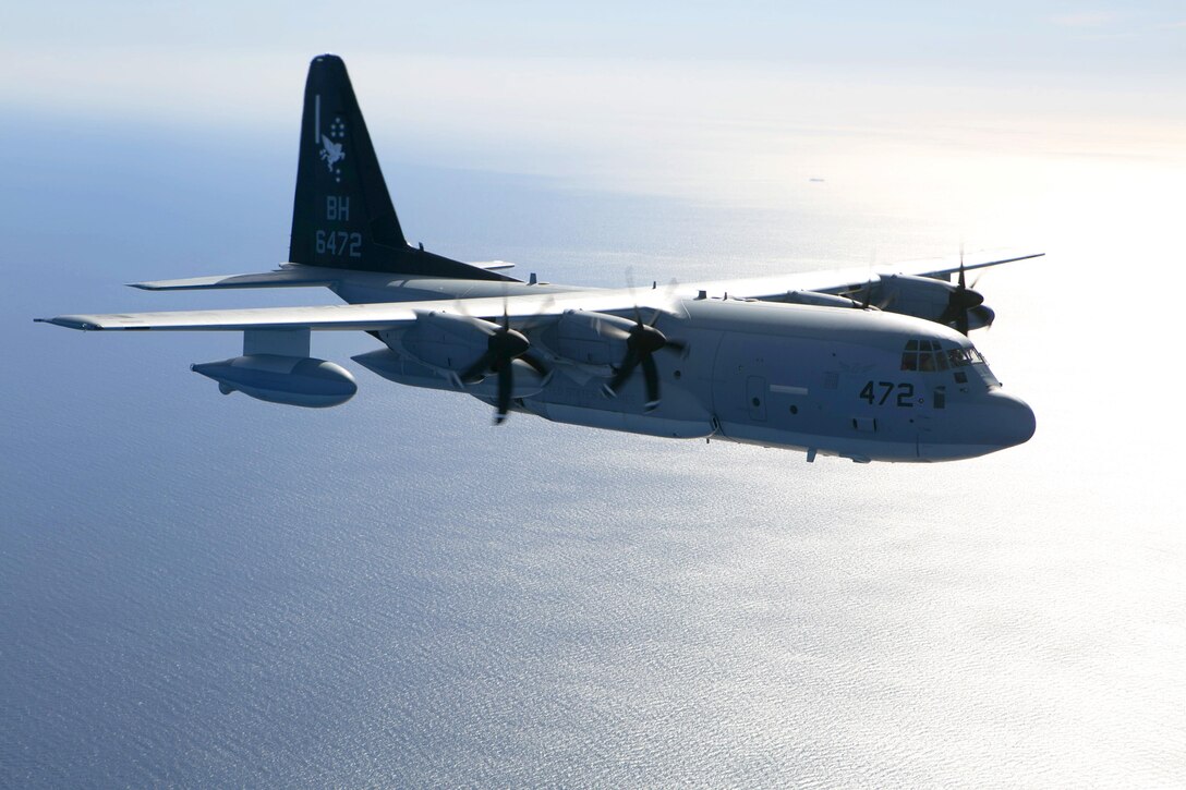 Two KC-130J Hercules tankers with Special-Purpose Marine Air-Ground Task Force Crisis Response-Africa, conduct a formation flight near Moròn Air Base, Spain, March 25, 2015. The Hercules, largely used to transport assets and refuel additional aircraft, is utilized for crisis-response missions ranging from disaster relief and humanitarian aid to embassy evacuation and security operations. (U.S. Marine Corps photograph by 1st Lt. Danielle Dixon/Released)