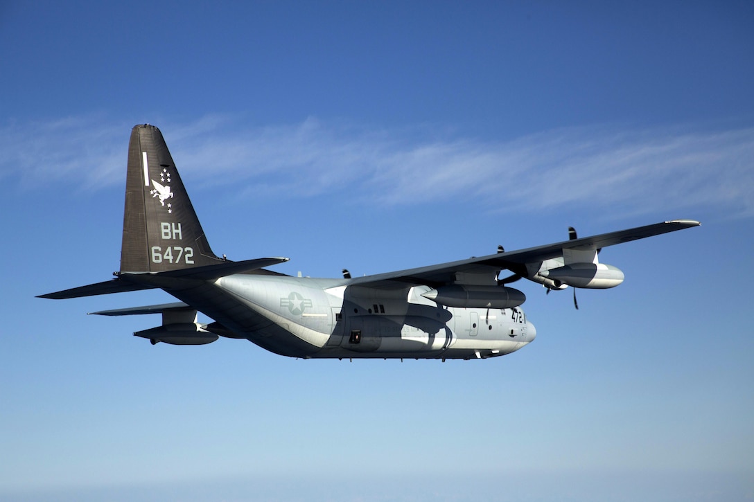 Two KC-130J Hercules tankers with Special-Purpose Marine Air-Ground Task Force Crisis Response-Africa, conduct a formation flight near Moròn Air Base, Spain, March 25, 2015. The Hercules, largely used to transport assets and refuel additional aircraft, is utilized for crisis-response missions ranging from disaster relief and humanitarian aid to embassy evacuation and security operations. (U.S. Marine Corps photograph by 1st Lt. Danielle Dixon/Released)
