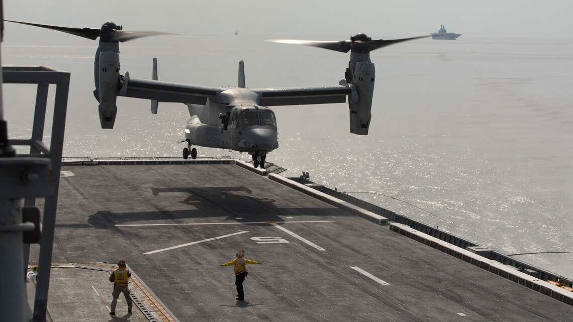 A U.S. Marine Corps MV-22B Osprey prepares to land on the flight deck of the Republic of Korea ship Dokdo (LPH 6111), at sea, March 26, 2015. This was the first time an Osprey has landed on a ROK amphibious assault ship. The aircraft is with Marine Medium Tiltrotor Squadron 262 (Reinforced), 31st Marine Expeditionary Unit. The Marines of the 31st MEU are embarked aboard the forward-deployed amphibious assault ship USS Bonhomme Richard (LHD 6) and are currently participating in Korean Marine Exchange Program 15 during the MEU’s annual Spring Patrol of the Asia-Pacific region. 