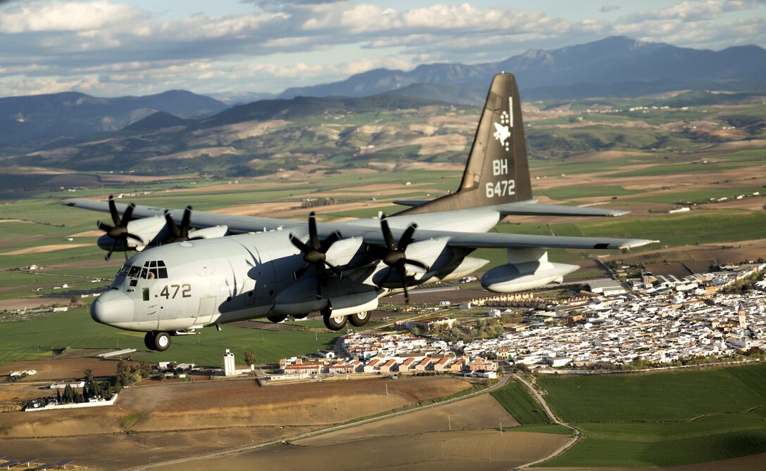 Two KC-130J Hercules tankers with Special-Purpose Marine Air-Ground Task Force Crisis Response-Africa, conduct a formation flight near Moròn Air Base, Spain, March 25, 2015. The Hercules is an asset to the SPMAGTF with refueling, cargo, and passenger transport capabilities. (U.S. Marine Corps photograph by 1st Lt. Danielle Dixon/Released)