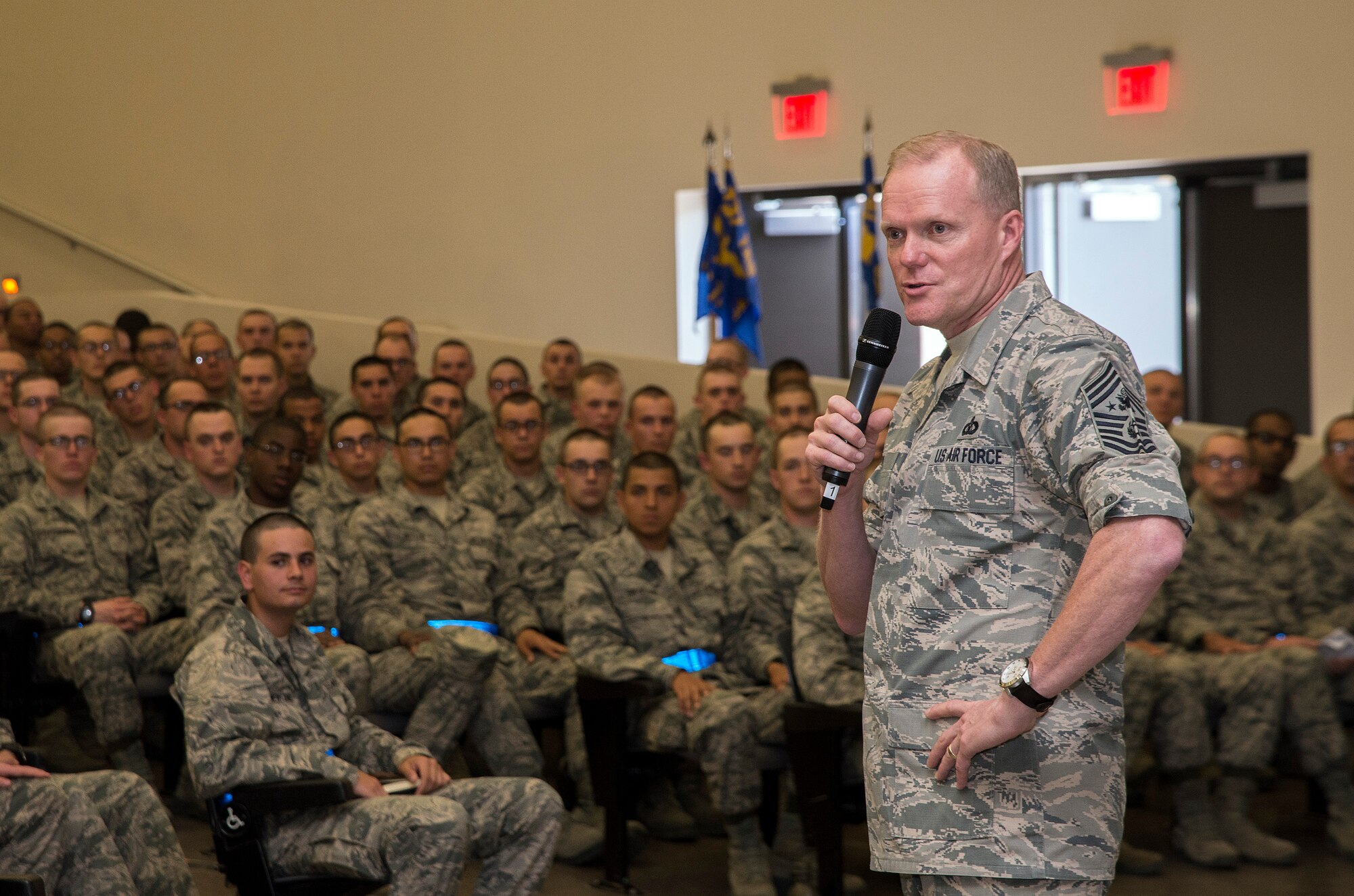 Chief Master Sgt. of the Air Force James A. Cody addresses the first Capstone Week class March 26, 2015, at Joint Base San Antonio-Lackland, Texas. Capstone is a five-day program that closes Air Force Basic Military Training. During Capstone, the Air Force's newest Airmen learn about the importance of wingmanship, resiliency, leadership and followership, sexual assault prevention and response, the warrior ethos, and how Airmen can balance their personal and professional lives. Capstone Week’s purpose is to further develop professional, resilient Airmen who are inspired by heritage, committed to its core values, and motivated to deliver airpower. While BMT will still provide new Airmen the same high level of military and physical training, Capstone Week serves to specifically concentrate on character building. (U.S. Air Force photo by Johnny Saldivar)