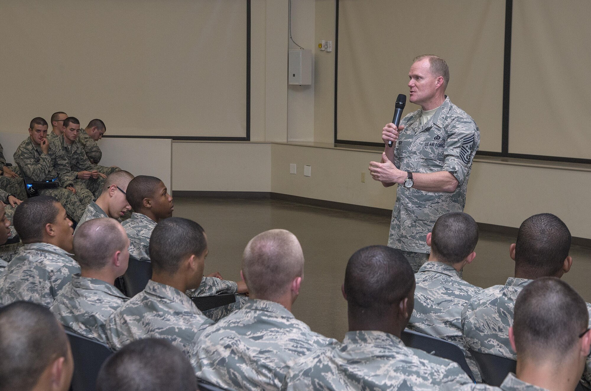 Chief Master Sgt. of the Air Force James A. Cody addresses the first Capstone Week class March 26, 2015, at Joint Base San Antonio-Lackland, Texas. Capstone is a five-day program that closes Air Force Basic Military Training. During Capstone, the Air Force's newest Airmen learn about the importance of wingmanship, resiliency, leadership and followership, sexual assault prevention and response, the warrior ethos, and how Airmen can balance their personal and professional lives. Capstone Week’s purpose is to further develop professional, resilient Airmen who are inspired by heritage, committed to its core values, and motivated to deliver airpower. While BMT will still provide new Airmen the same high level of military and physical training, Capstone Week serves to specifically concentrate on character building. (U.S. Air Force photo by Johnny Saldivar)