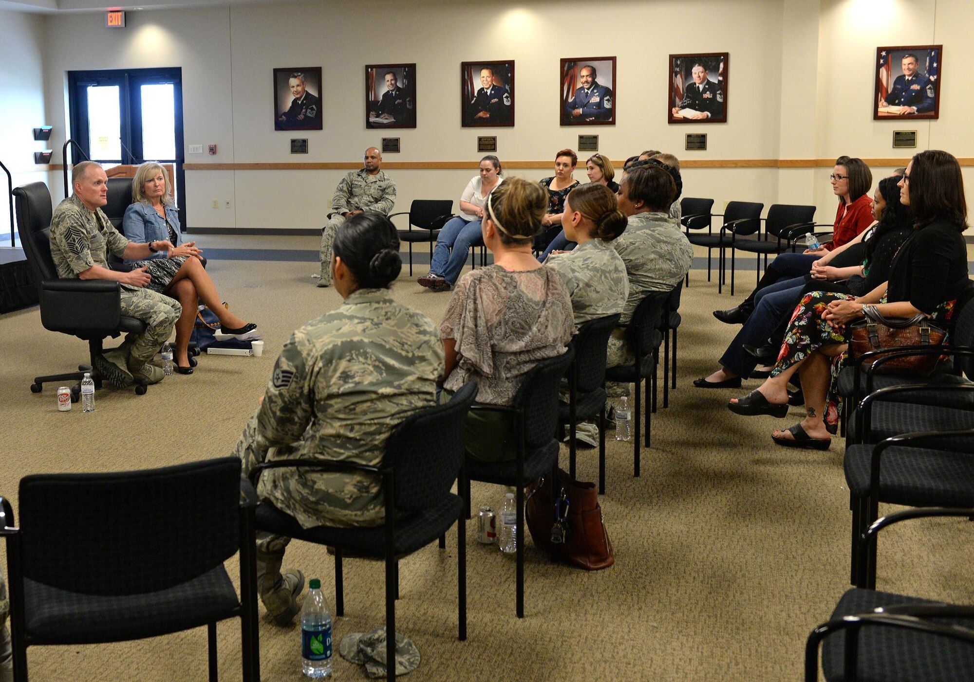 Chief Master Sgt. of the Air Force James A. Cody and his wife, retired Chief Master Sgt. Athena Cody speak with spouses of Air Force Military Training Instructors March 26, 2015 at Joint Base San Antonio-Lackland. The Codys met with the spouses to hear their input on the effect MTI Duty has on the family. (U.S. Air Force photo by Benjamin Faske)