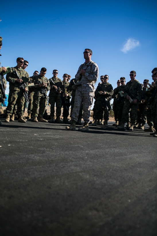 U.S. Marine Corps Capt. Kevin J. Fitzsimmons, a safety insert officer attending the infantry officers course, conducts a safety brief prior to a fast rope training exercise in preparation for Talon Reach during Weapons and Tactics Instructor Course (WTI 2-15) at Auxiliary Airfield 2 near Yuma, AZ., March 26, 2015. WTI is a seven-week event hosted by Marine Aviation Weapons and Tactics Squadron One (MAWTS-1) cadre. MAWTS-1 provides standardized tactical training and certification of unit instructor qualifications to support Marine Aviation Training and Readiness and assists in developing and employing aviation weapons and tactics. (U.S. Marine Corps photo by Lance Cpl. Jodson B. Graves 2d MAW Combat Camera/Released)