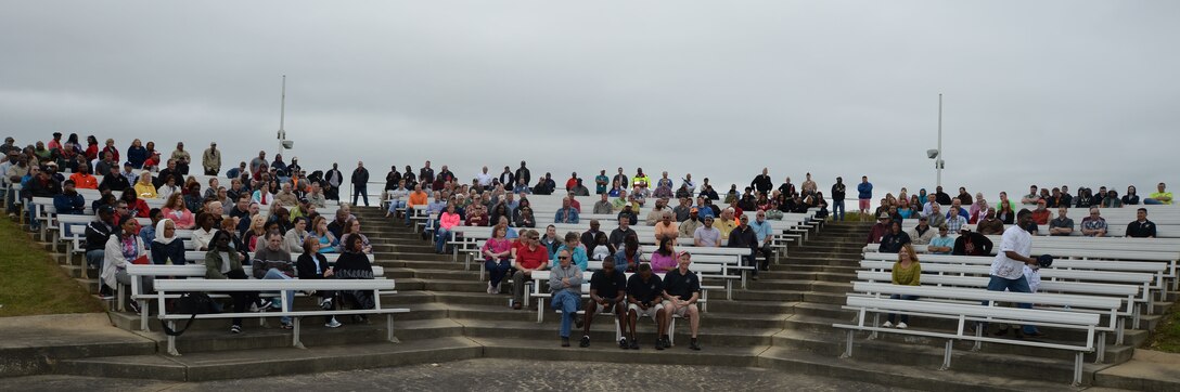 More than 150 plus base personnel fill the bleachers at Marine Corps Logistics Base Albany’s Boyett Park to witness friends and colleagues receive awards at the installation’s annual Employee Recognition Day Awards Ceremony, here, March 27. The crowd applauded and cheered as employees were presented with varies certificates, colonel’s coins and accolades during the event.