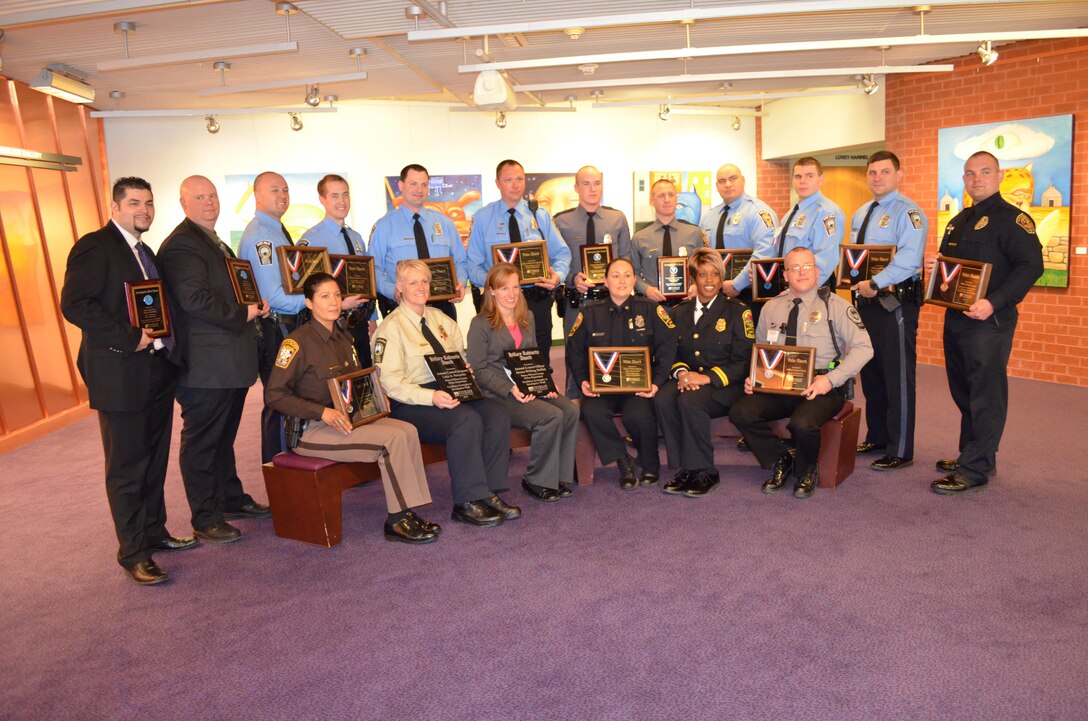 Officer John Covey, of the Marine Corps Base Quantico Provost Marshal Office, was honored by Prince William County in a ceremony on March 18 that recognized 21 police officers from Prince William County for valor. 