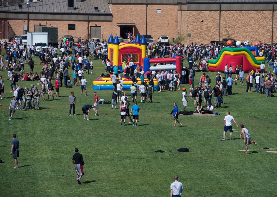 The Sheppard Air Force Base, Texas, community gather for a base-wide picnic March 28, 2015. Airmen and their families were invited to the picnic that included outdoor carnival games, lunch, an Easter egg hunt, face painting and a parade. (U.S. Air Force photo by Senior Airman Kyle Gese)