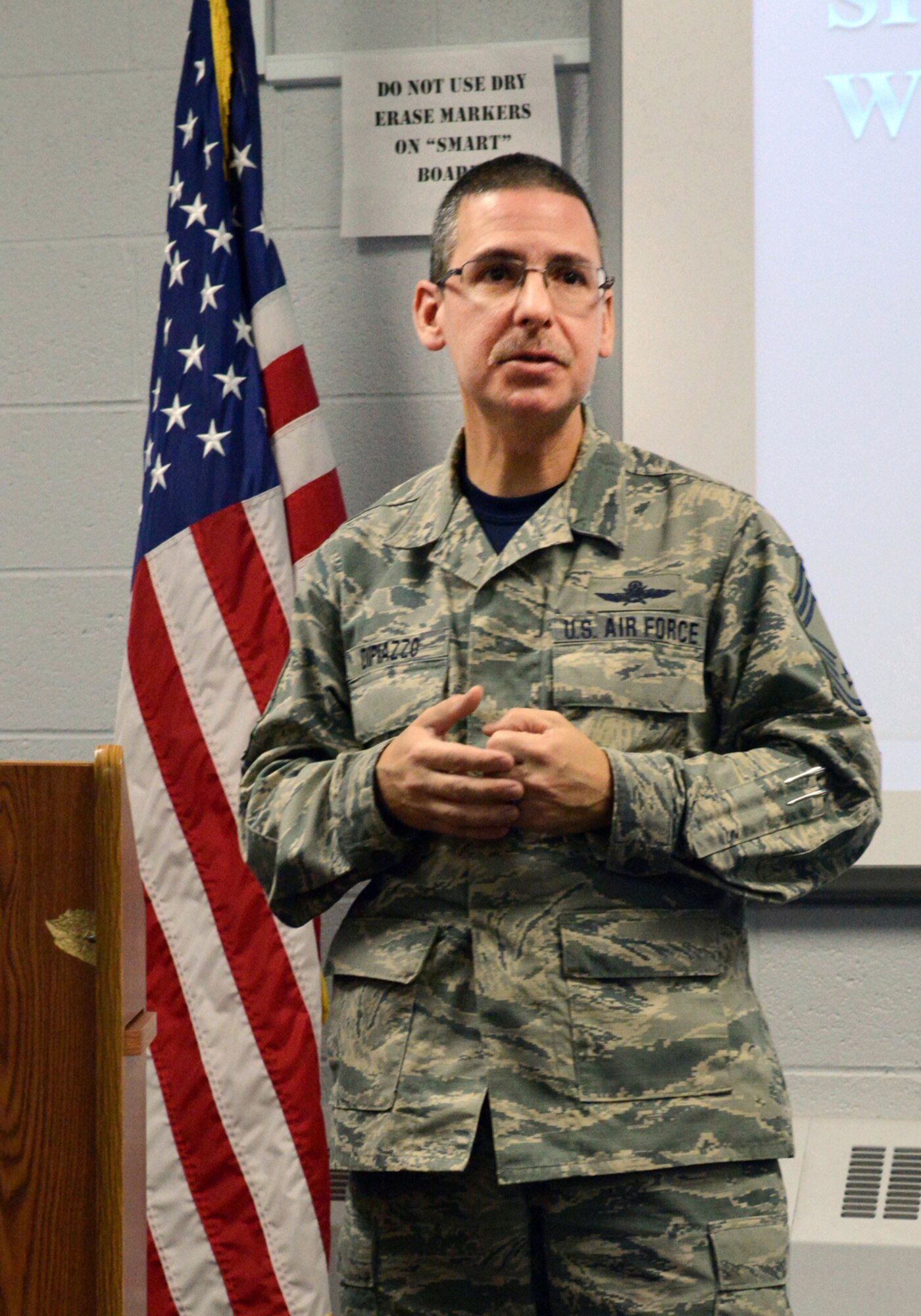 Chief Master Sgt. Dennis Dipiazzo, 138th Fighter Wing communications chief, gives a speech to airmen attending a "Rising 6" organization meeting. The organization was recently reactivated by the senior non-commissioned officer’s council to help junior enlisted airmen to have a voice on base, and establish rapport and morale with other guard personnel. (U.S. National Guard photo by Tech. Sgt. Jeffery Foster/Released)