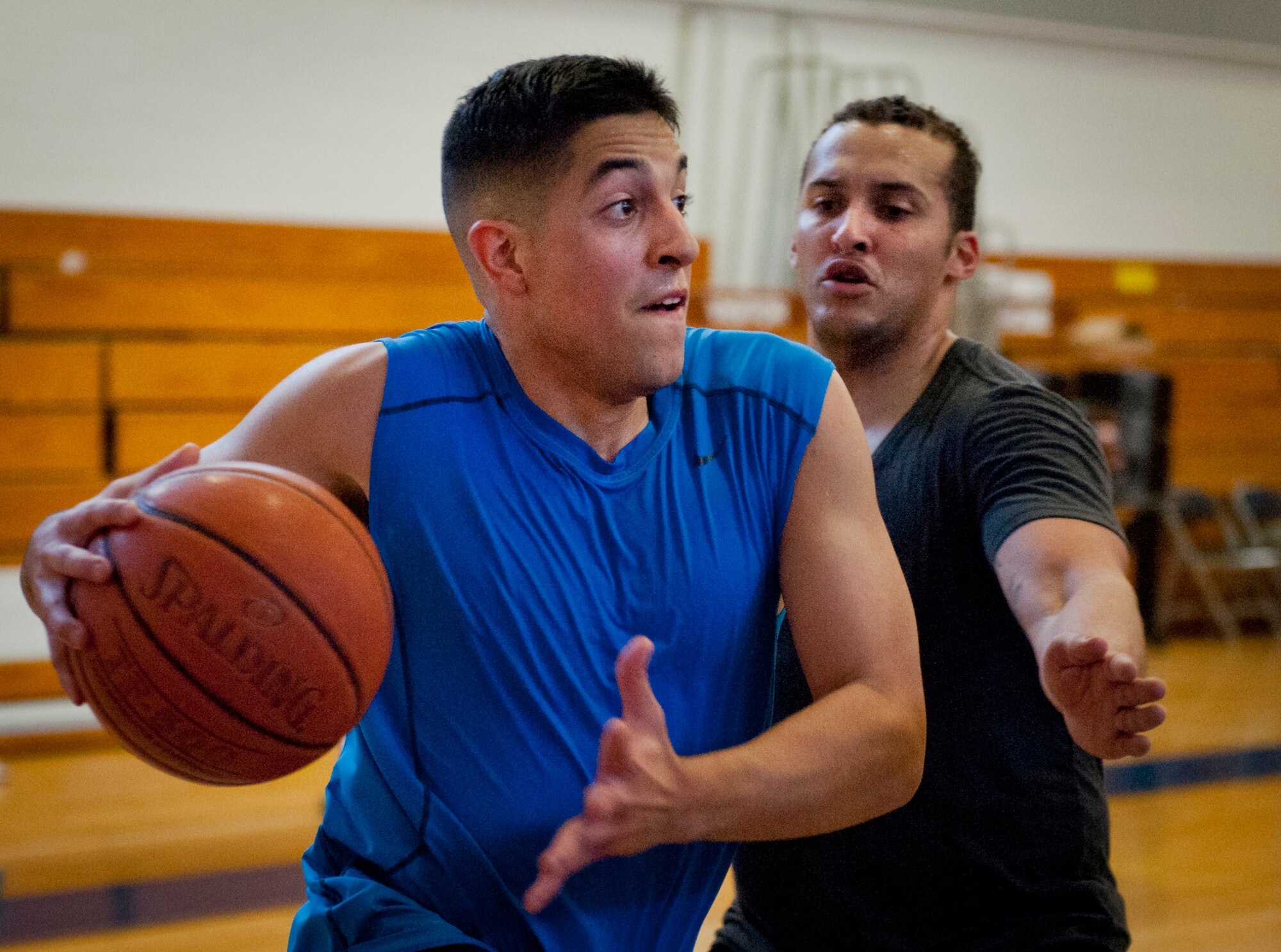 A competitor drives to the basket during a three-on-three tournament held March 20 at Eglin Air Force Base, Fla. A variety of teams battled it out in the double elimination contest. (U.S. Air Force photo/Samuel King Jr.)