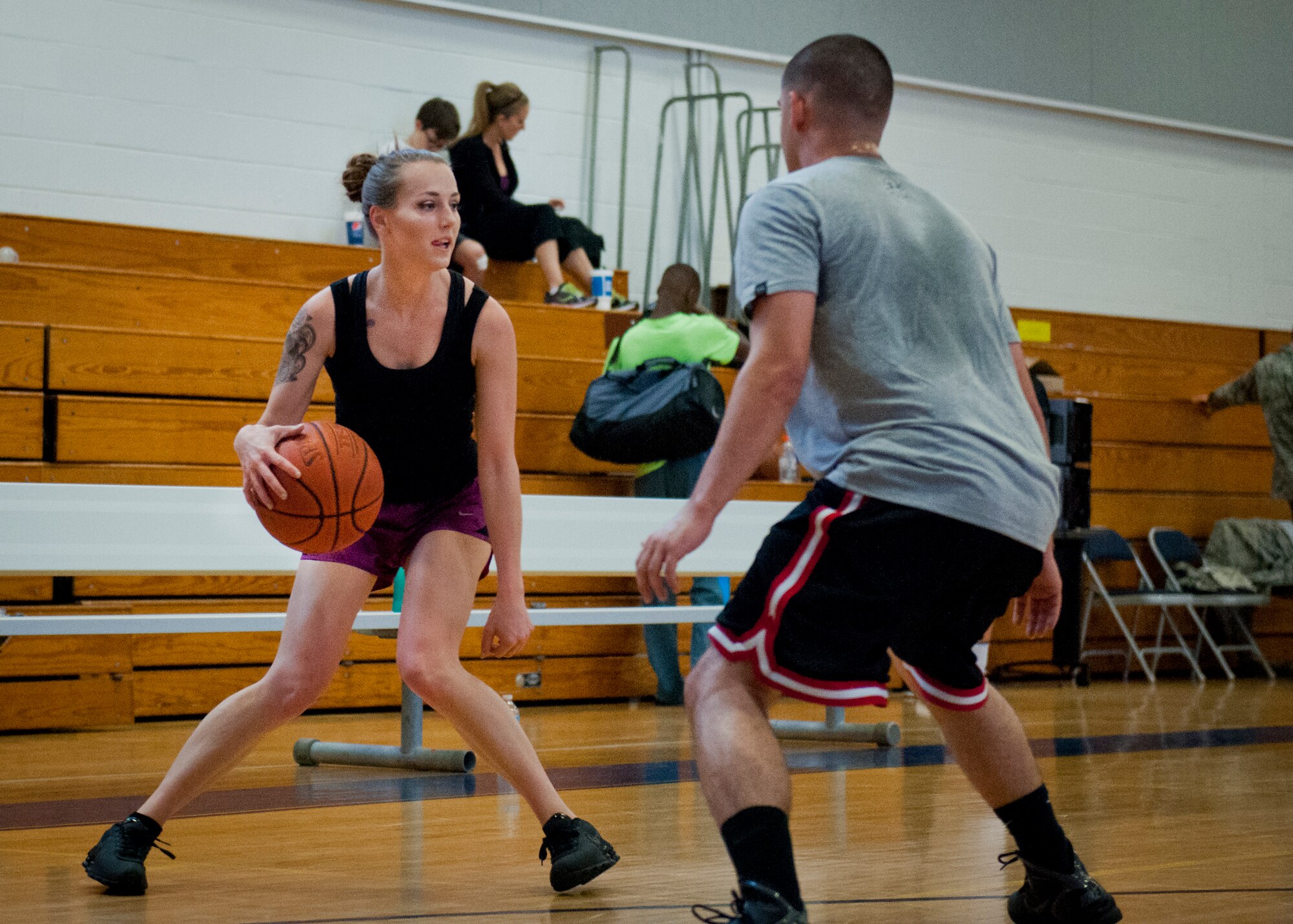 A competitor looks for an open team member during a three-on-three tournament held March 20 at Eglin Air Force Base, Fla. A variety of teams battled it out in the double elimination contest. (U.S. Air Force photo/Samuel King Jr.)