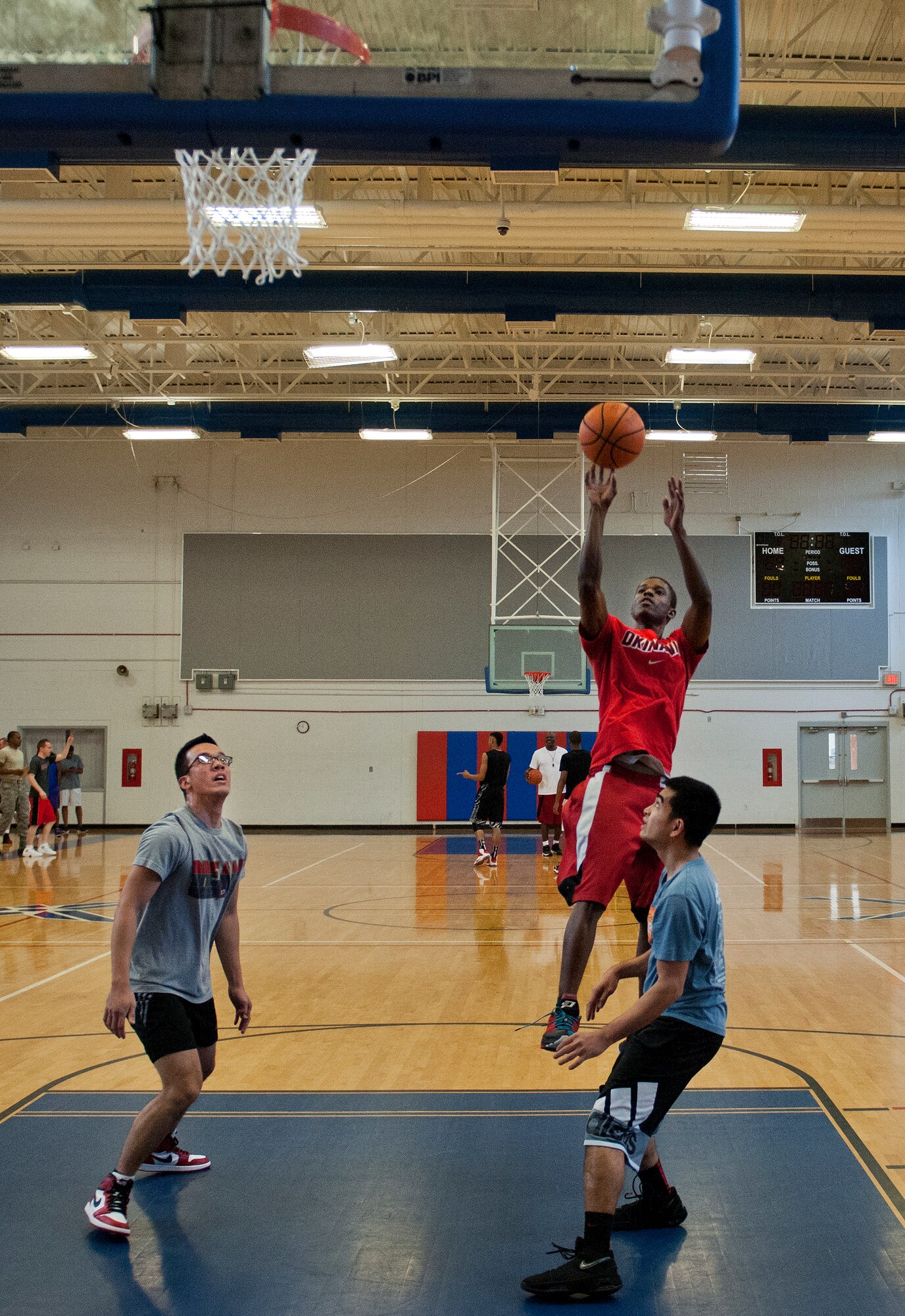 A competitor takes a shot from inside the foul line during a three-on-three tournament held March 20 at Eglin Air Force Base, Fla. A variety of teams battled it out in the double elimination contest. (U.S. Air Force photo/Samuel King Jr.)