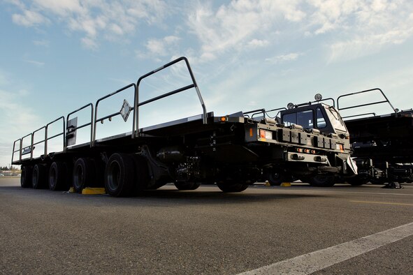 The Tunner 60K aircraft cargo loader-transporter is one of the main working vehicles used by aerial port specialists, in theater and at home station. It's a highly mobile vehicle system that can transport up to six pallets of cargo at 23 mph. Its deck elevates from 39 inches to 18.5 feet high and employs a powered conveyor system to move cargo. The deck has pitch, roll, yaw and side-to-side adjustment for quick, efficient interface with military and commercial cargo aircraft, including the C-17. The 446th Airlift Wing's 86th and 36th Aerial Port Squadrons at Joint Base Lewis-McChord, Washington are in the market for Air Transportation specialists. (U.S. Air Force Reserve photo by Jake Chappelle)
