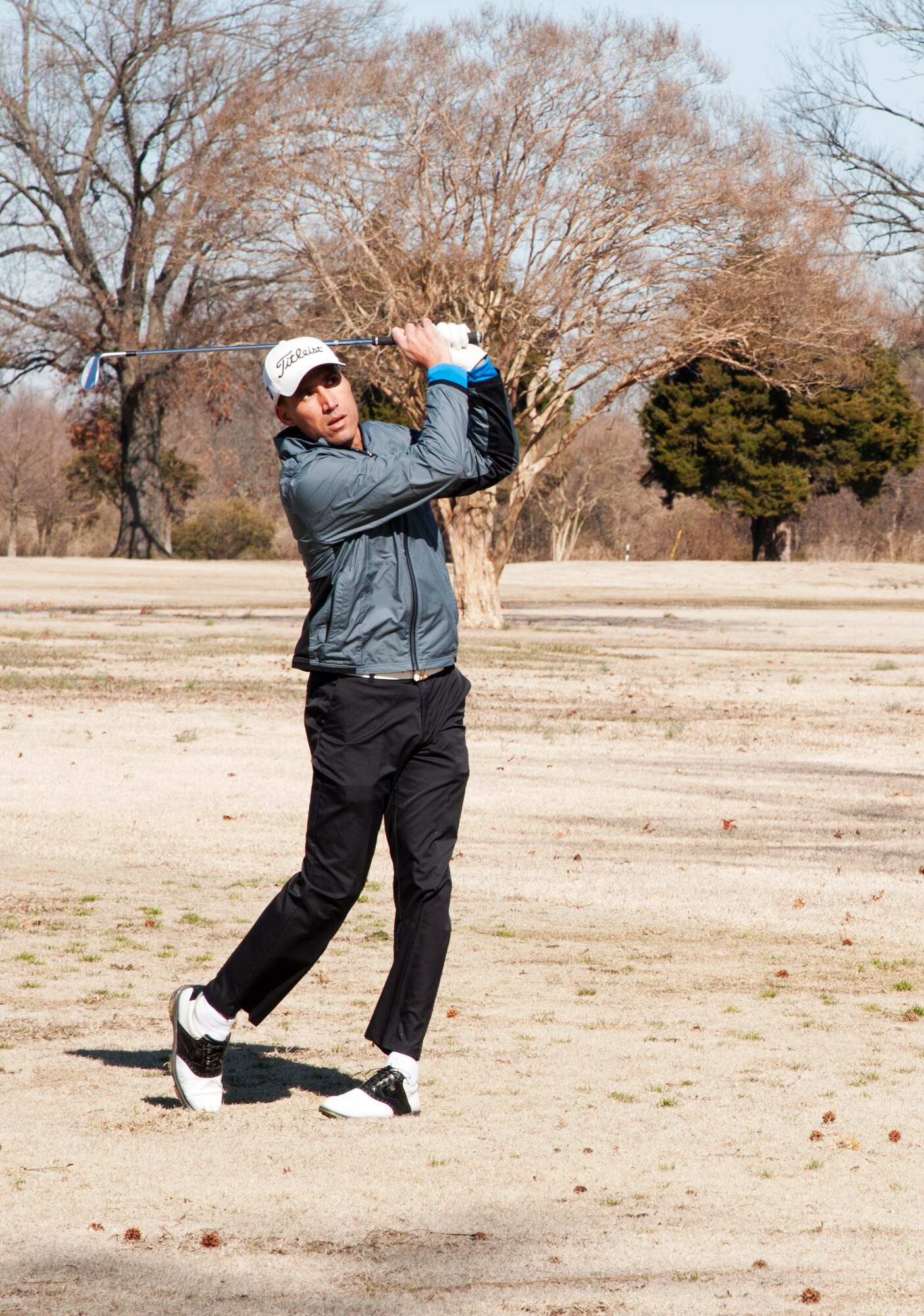 Air Force Sen. Master Sgt. Spencer Mims practices at Englewood Golf Course Langley Air Force Base, Va., February 4, 2015 for the upcoming World Military Games. Mims and seven more players will be the first Armed Forces Golf team to compete in the World Military Games this October in South Korea. (U.S. Air Force photo Candice Page/Released)